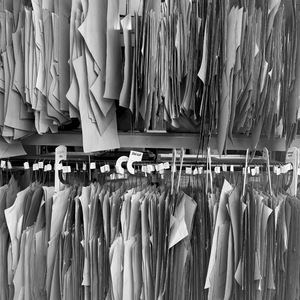 rail of patterns at the gushlow & cole workshop - Inside the Spring Workshop | Blog | Gushlow & Cole