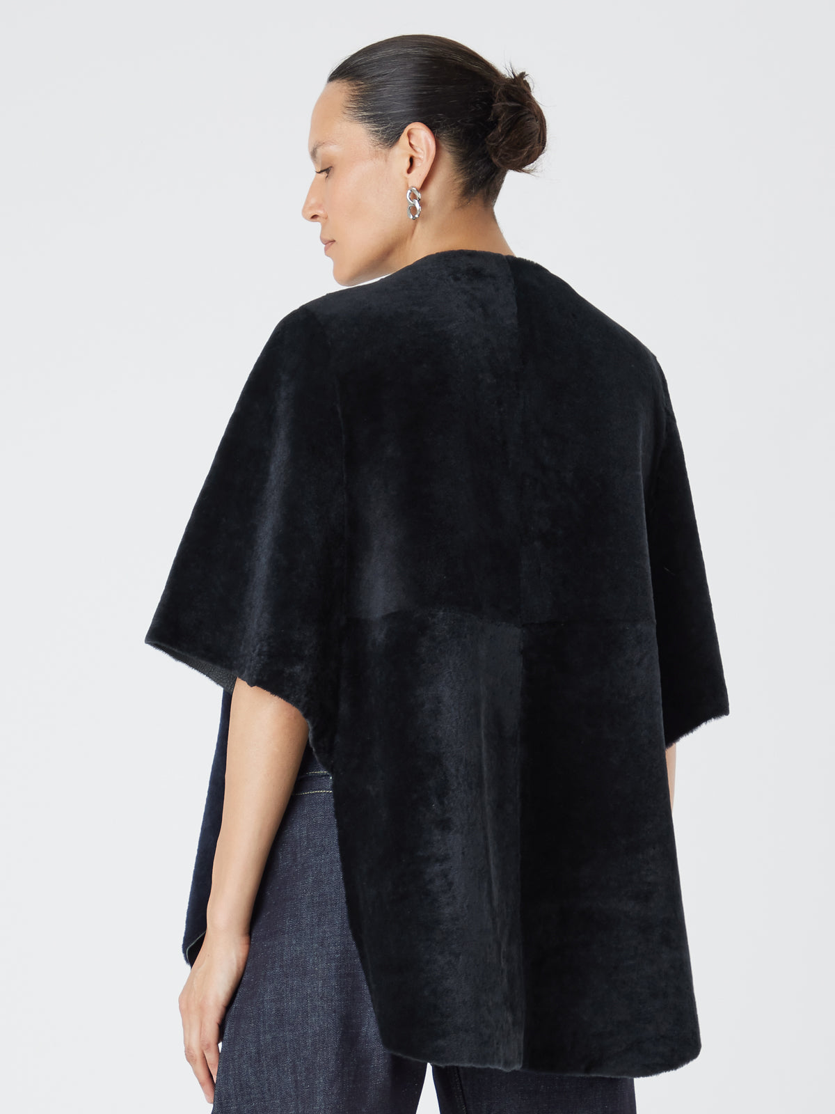 Black Collarless Shearling Cape | Womens | Gushlow & Cole- model crop back