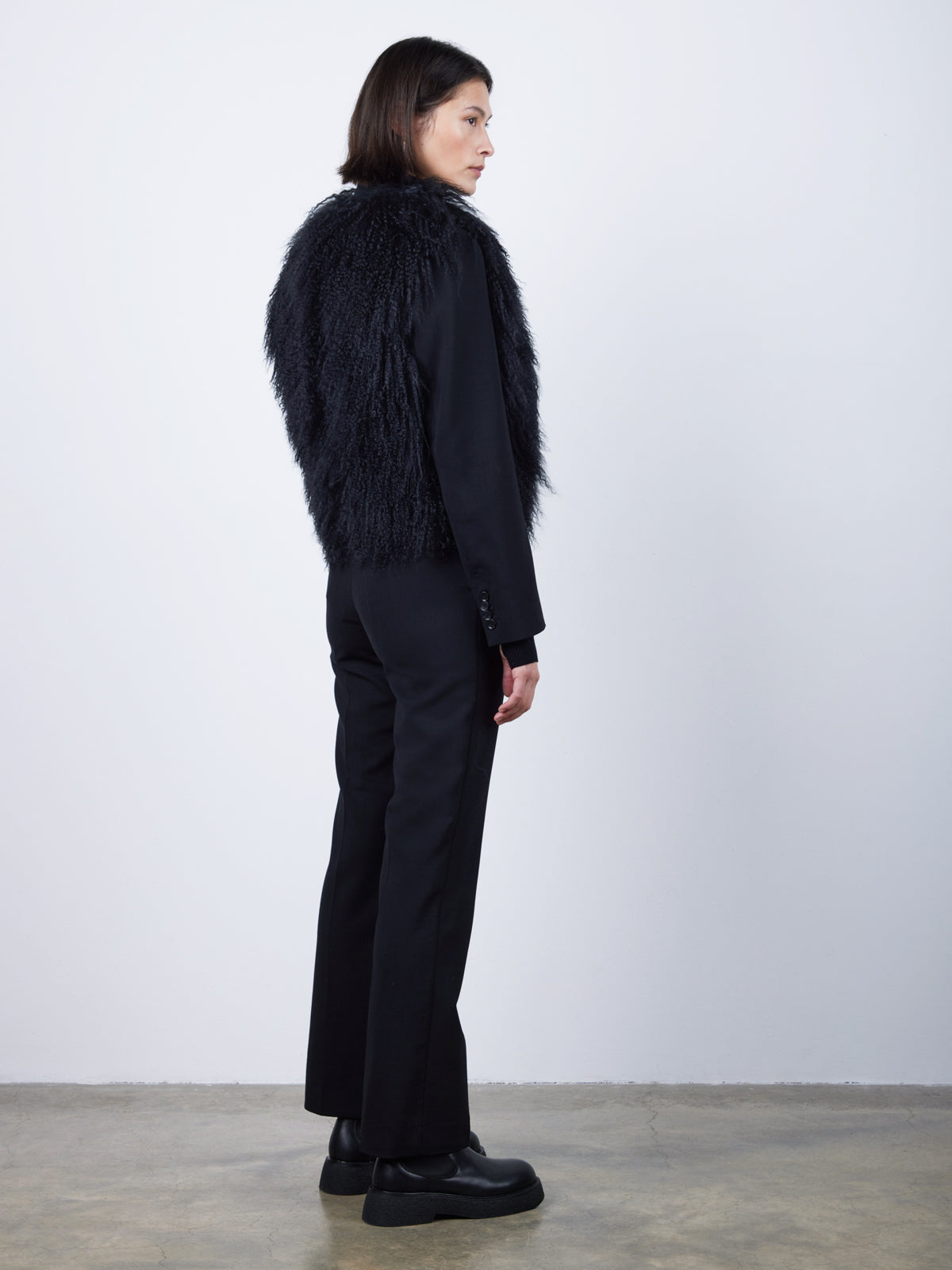 Black Mongolian Shearling Gilet | Womens | Gushlow & Cole-model wearing gilet side