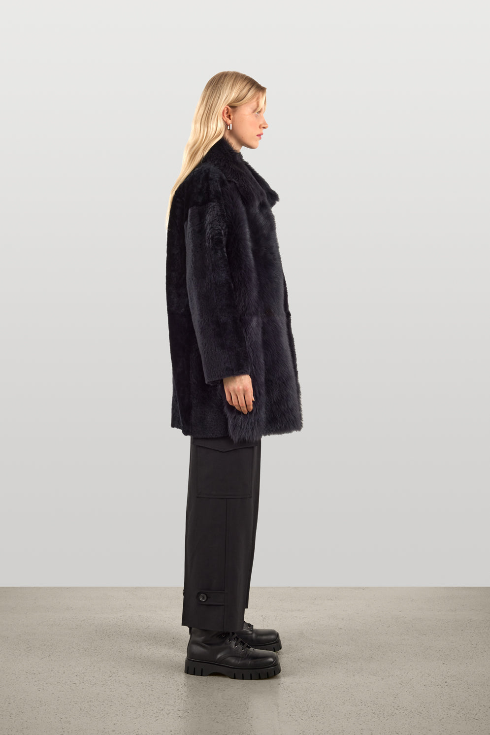 Black Shearling Taper Coat | Womens Luxury Shearling | Gushlow & Cole | model full length side