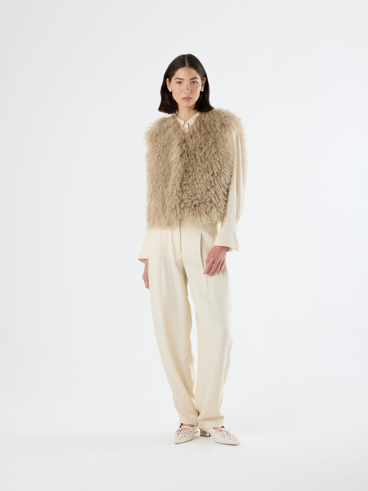 woman wearing camel Mongolian Shearling Gilet gushlow & Cole full length on white background