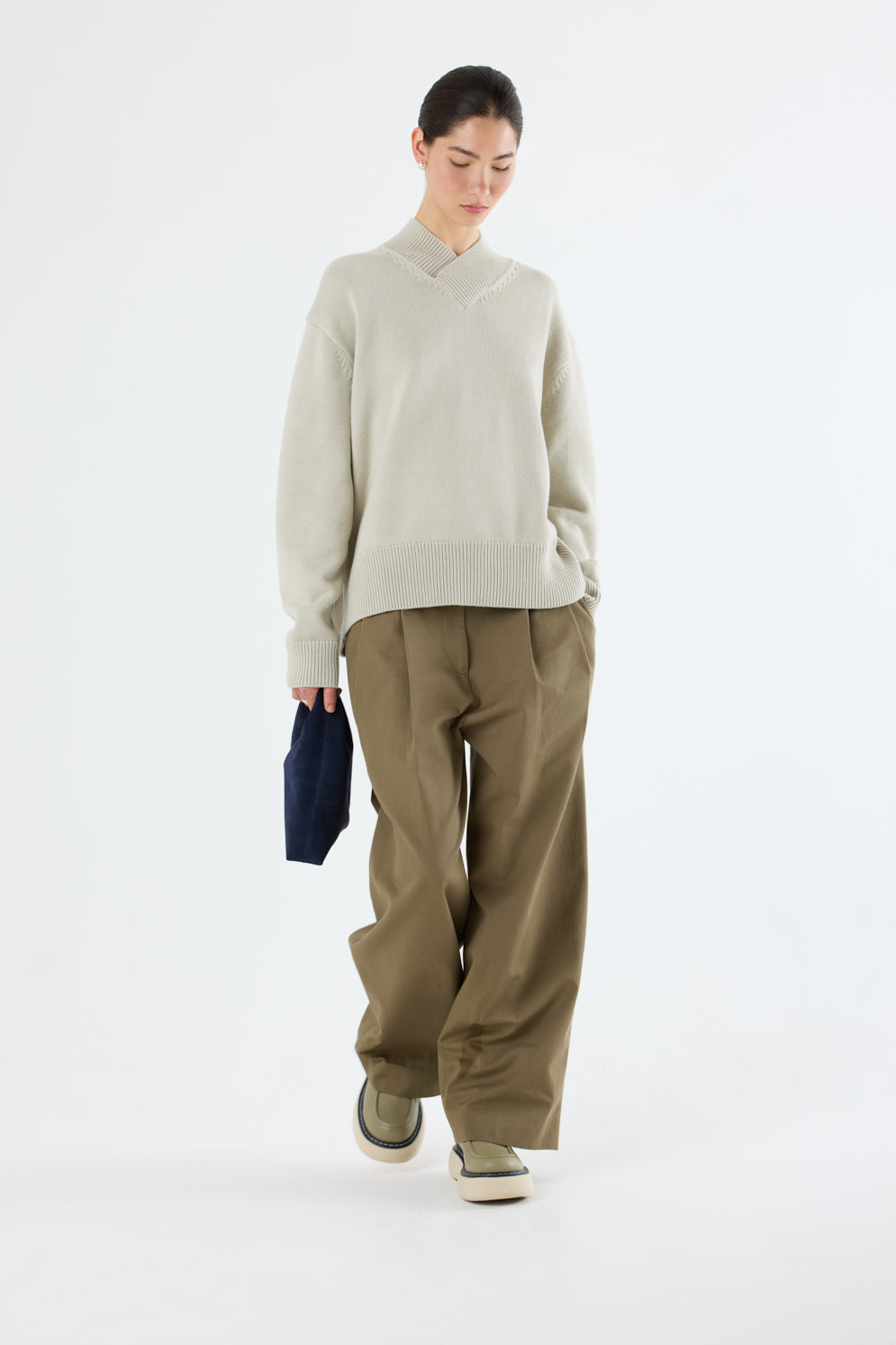 Clara Small Navy Blue Suede Shoulder Bag | Bags | Gushlow & Cole - full length model holding bag front on