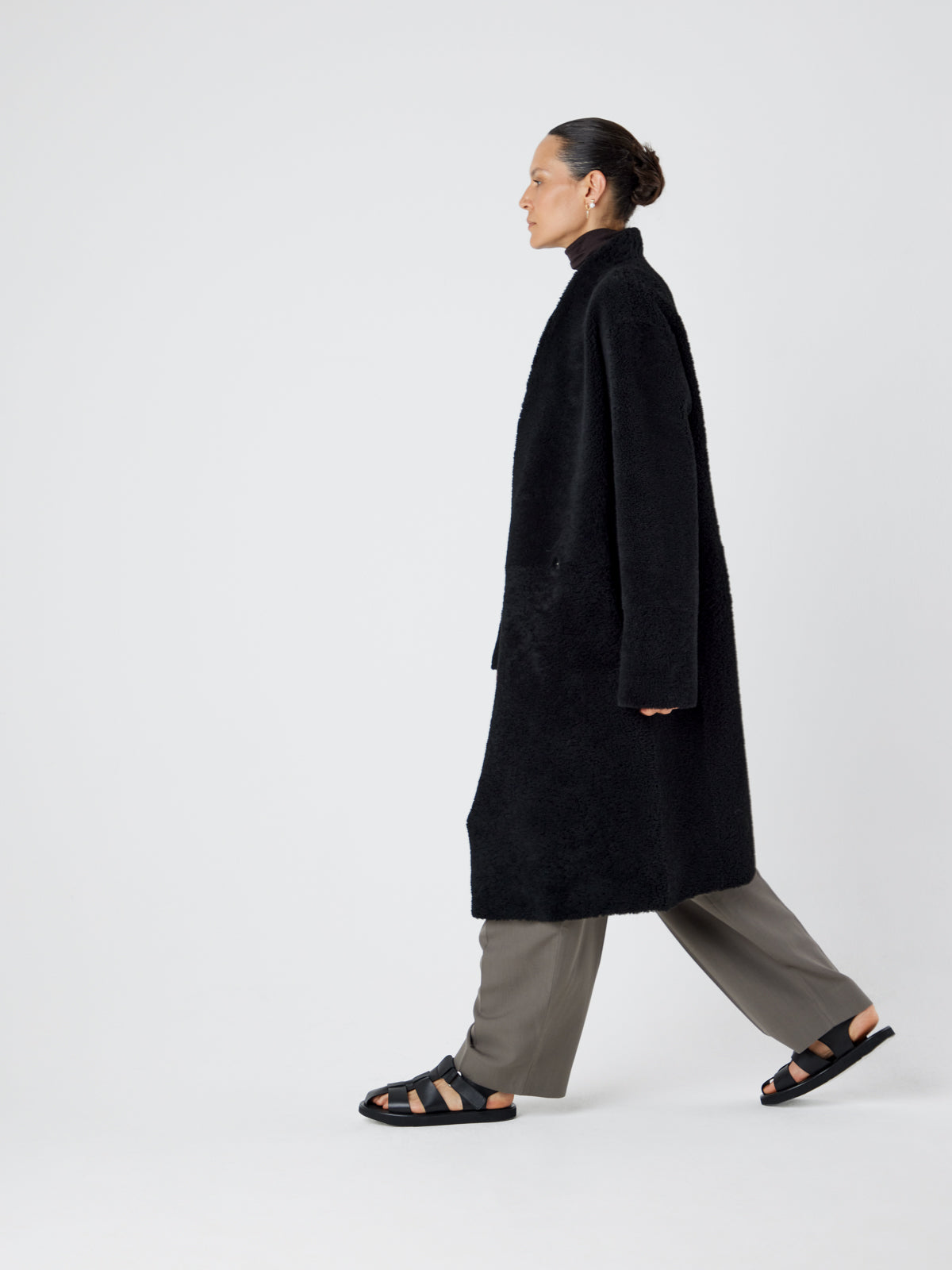 Collarless Black Shearling Wrap Coat | Womens | Gushlow & Cole - model length leather out coat side