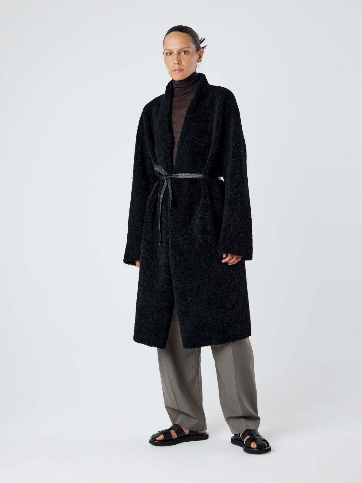 Collarless Black Shearling Wrap Coat | Womens | Gushlow & Cole - model length leather out coat with belt