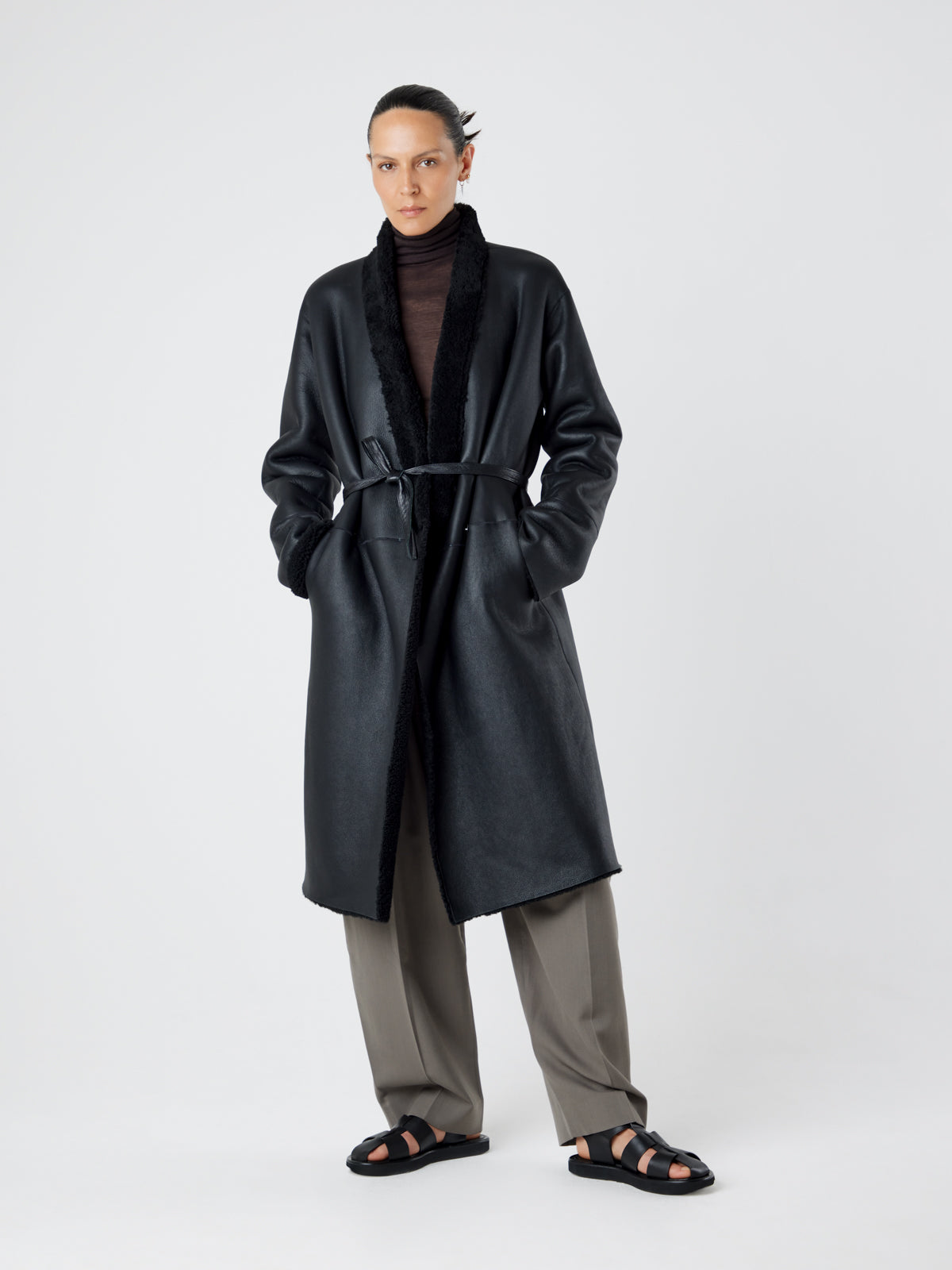 Collarless Black Shearling Wrap Coat | Womens | Gushlow & Cole - model length leather out coat with belt