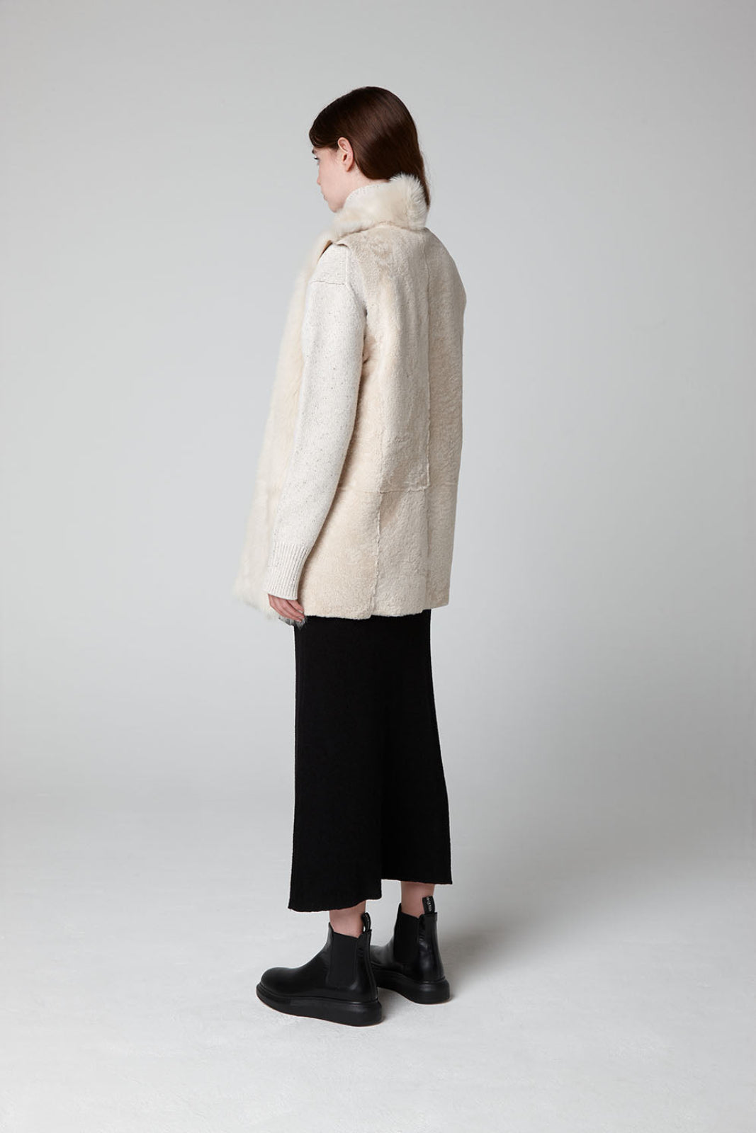 Cream Mid Length Rough Cut Mixed Shearling Gilet - model full length back wool out - women | gushlow & cole