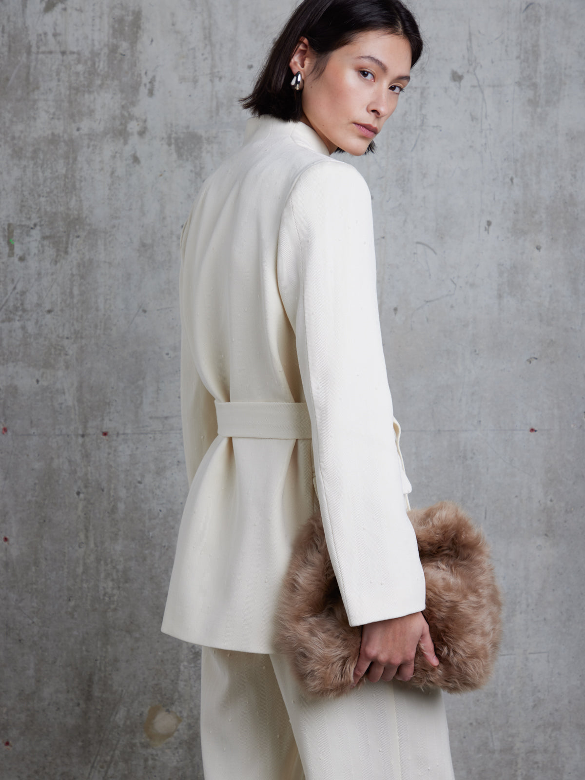 Curly Soft Shearling Camel Clutch Bag | Womens | Gushlow & Cole - model side crop