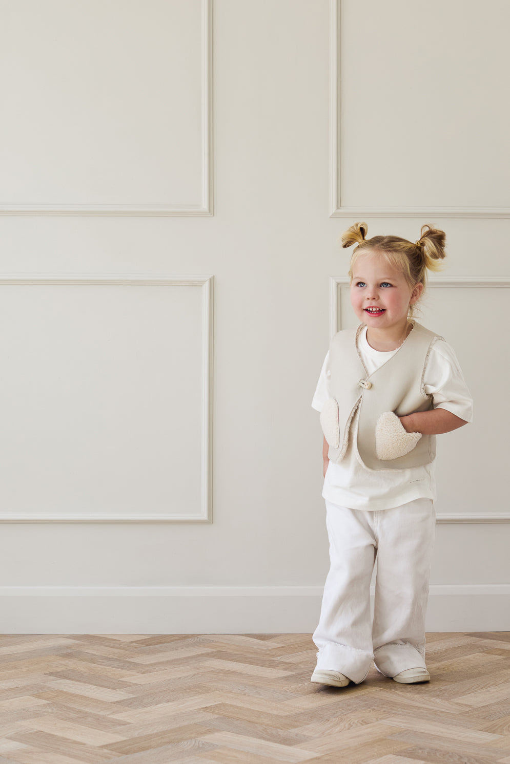 Edith White Shearling Heart Gilet | Kids | Gushlow & Cole-on model