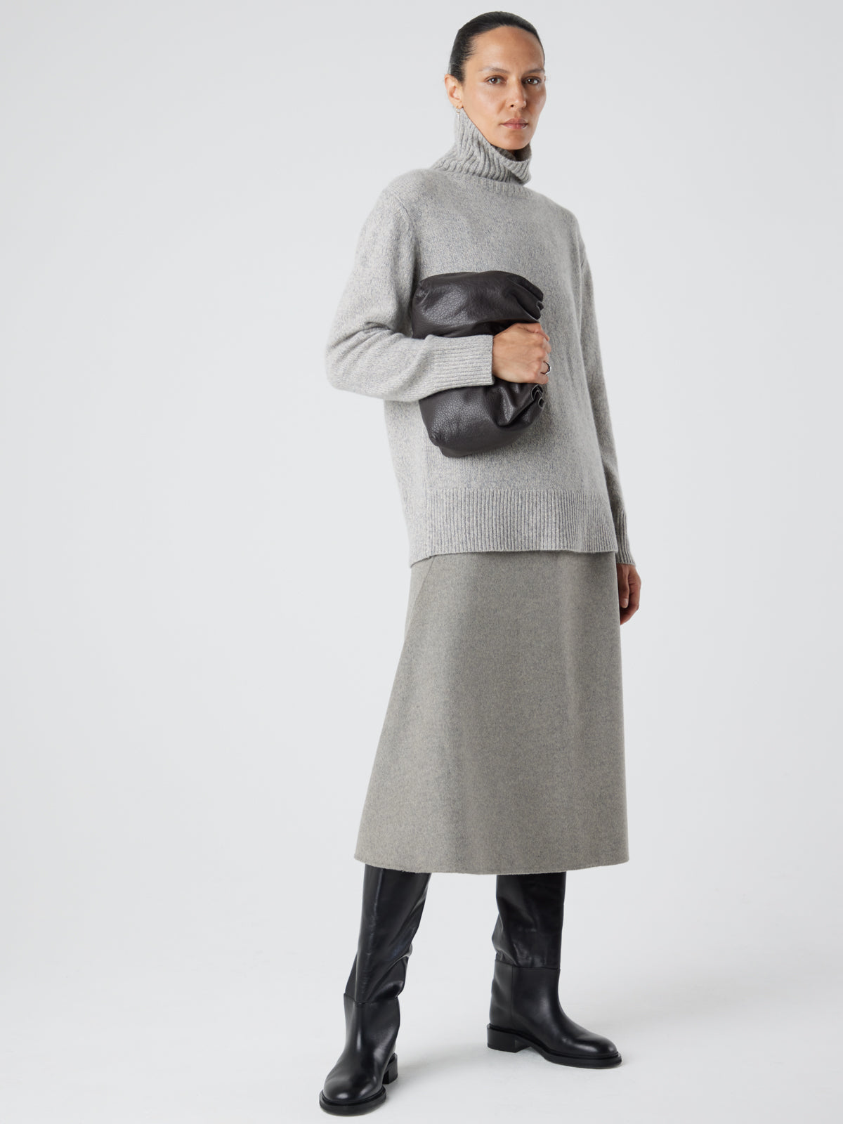 English Nappa Leather Soft English Nappa Clutch Bag in Storm Brown | Womens | Gushlow & Cole- model holding bag