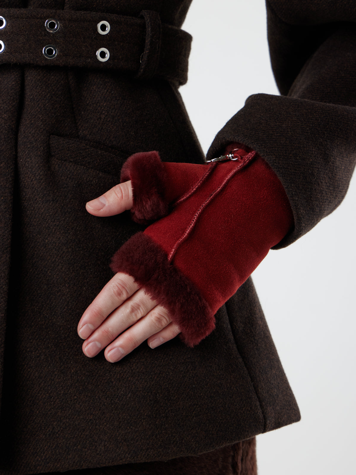 woman wearing Fingerless Red Shearling Mittens by Gushlow & Cole