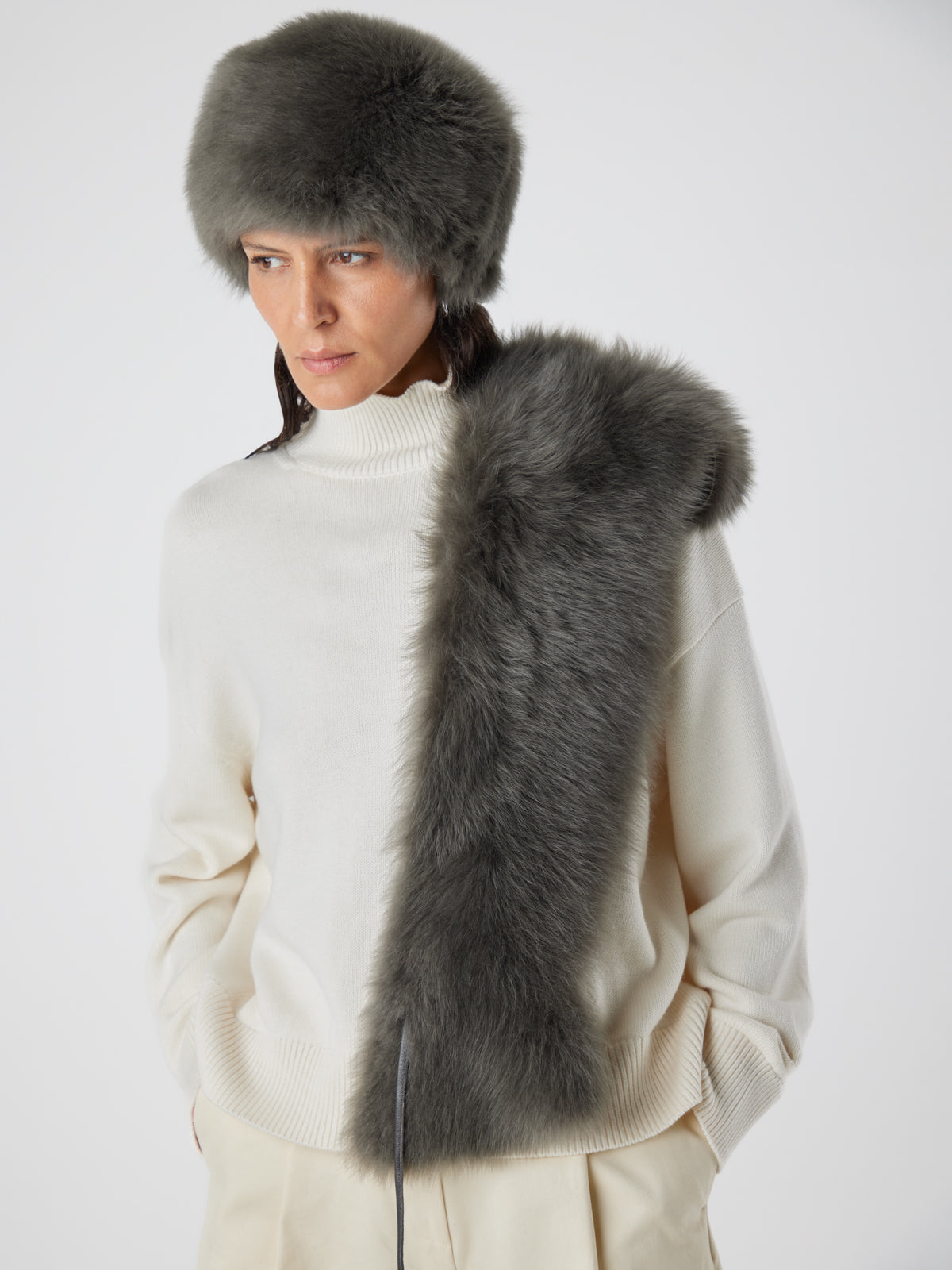 woman wearing storm green Shearling Russian Hat by gushlow & cole