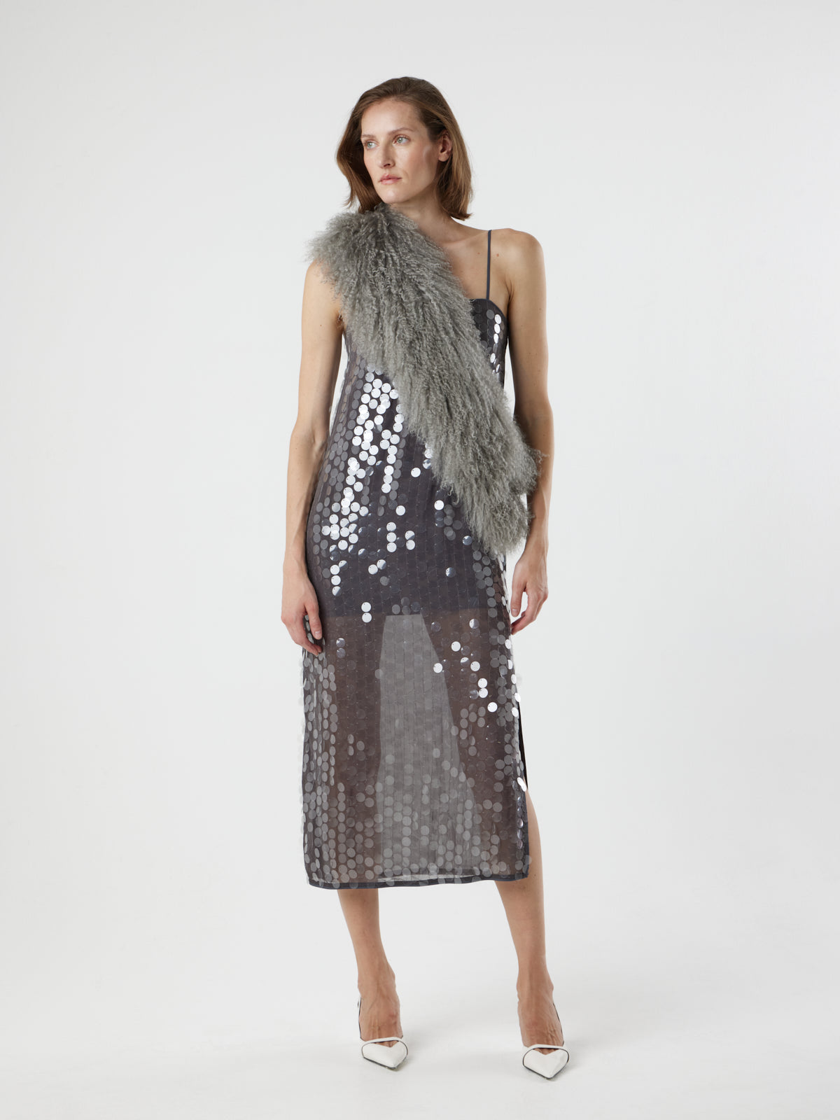 woman wearing grey Mongolian Shearling Shawl Scarf, styled as a sash, by gushlow & cole on white background