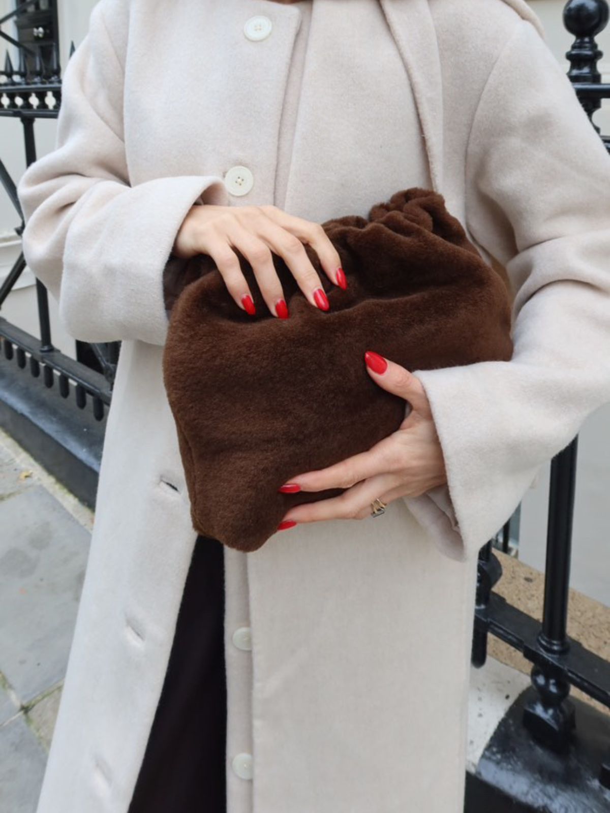 Merino Soft Shearling Clutch Bag | Womens | Gushlow & Cole - model holding bag