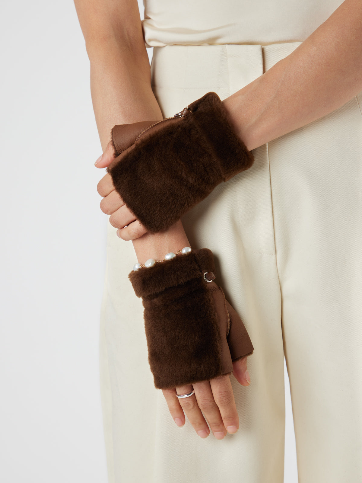 Mini Chestnut Brown Shearling Mittens | Womens | Gushlow & Cole-model with mittens