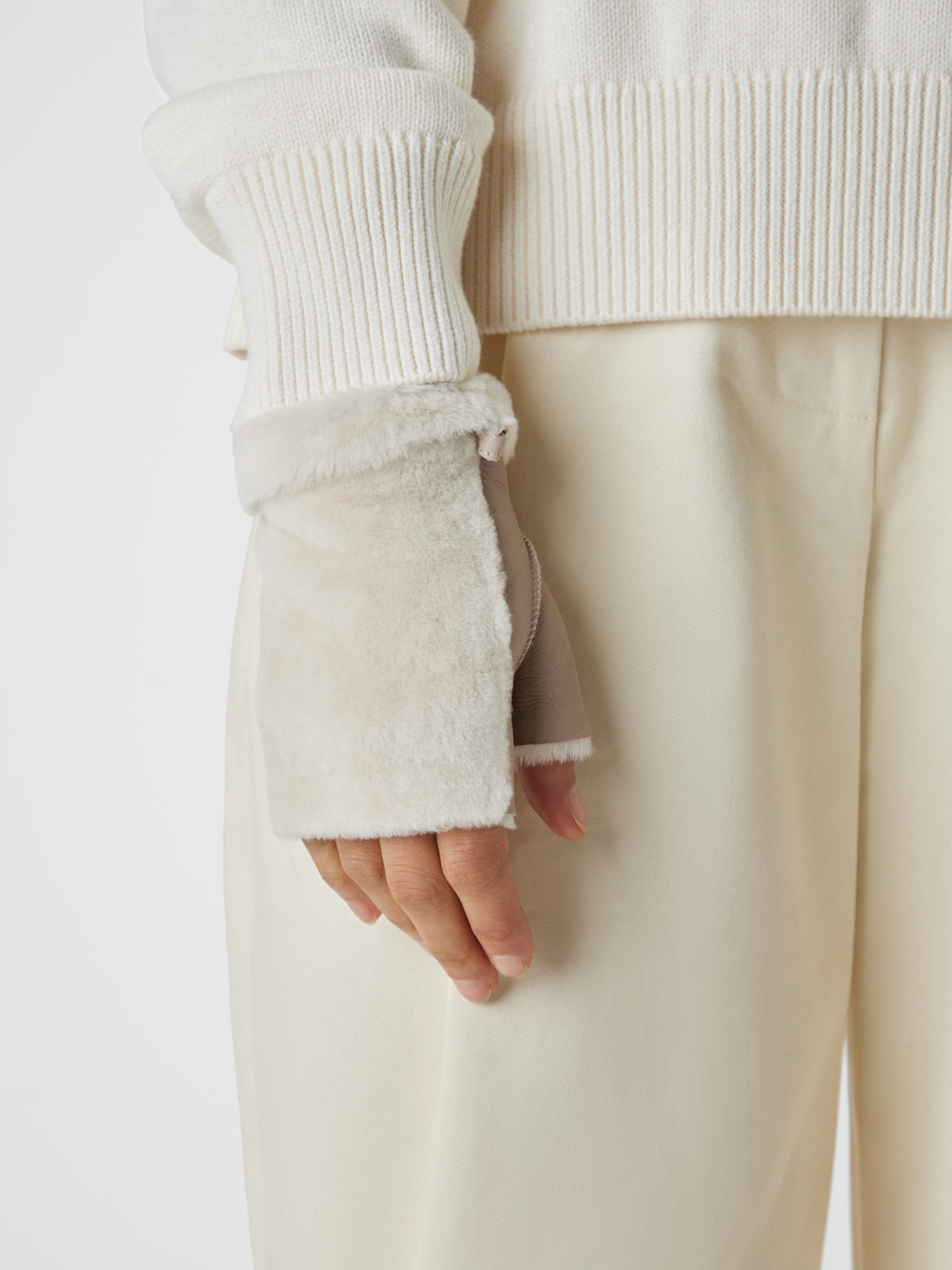 Mini Stone White Shearling Mittens | Womens | Gushlow & Cole-mittens on one hand