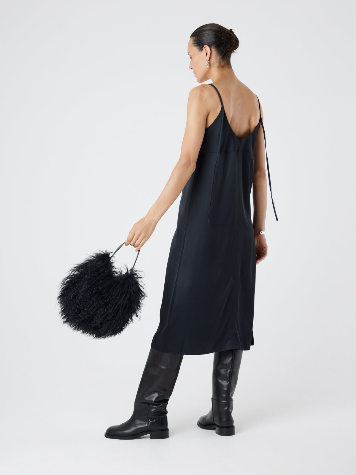 Mongolian Shearling Black Saddle Bag | Womens | Gushlow & Cole-model with bag