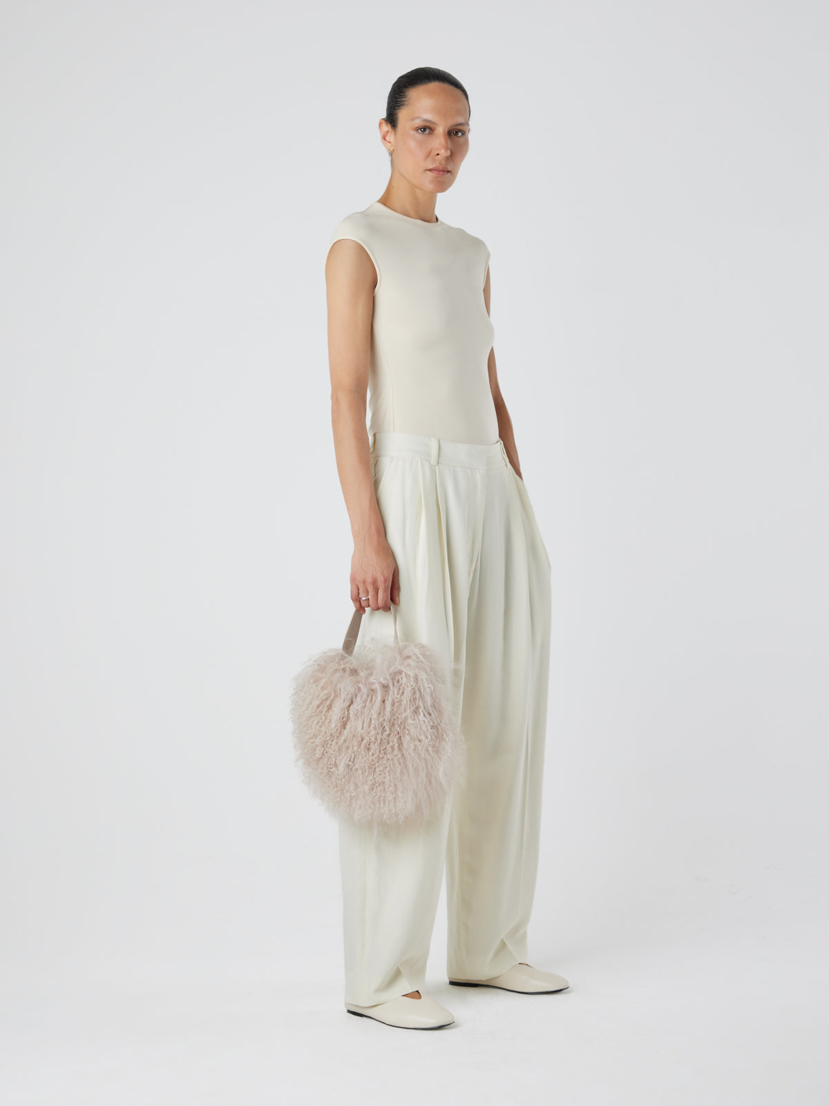 Mongolian Shearling Cream Saddle Bag | Bags | Gushlow & Cole - model full length