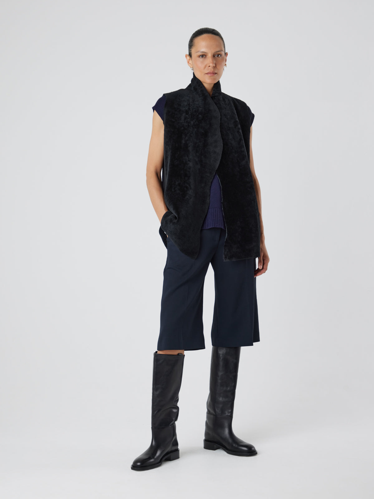 Natural Edge Graphite Black Mid Length Shearling Gilet - model full length