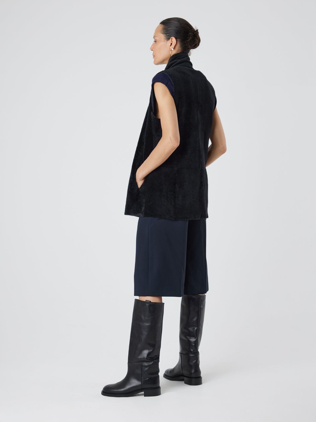 Natural Edge Graphite Black Mid Length Shearling Gilet - model full length back