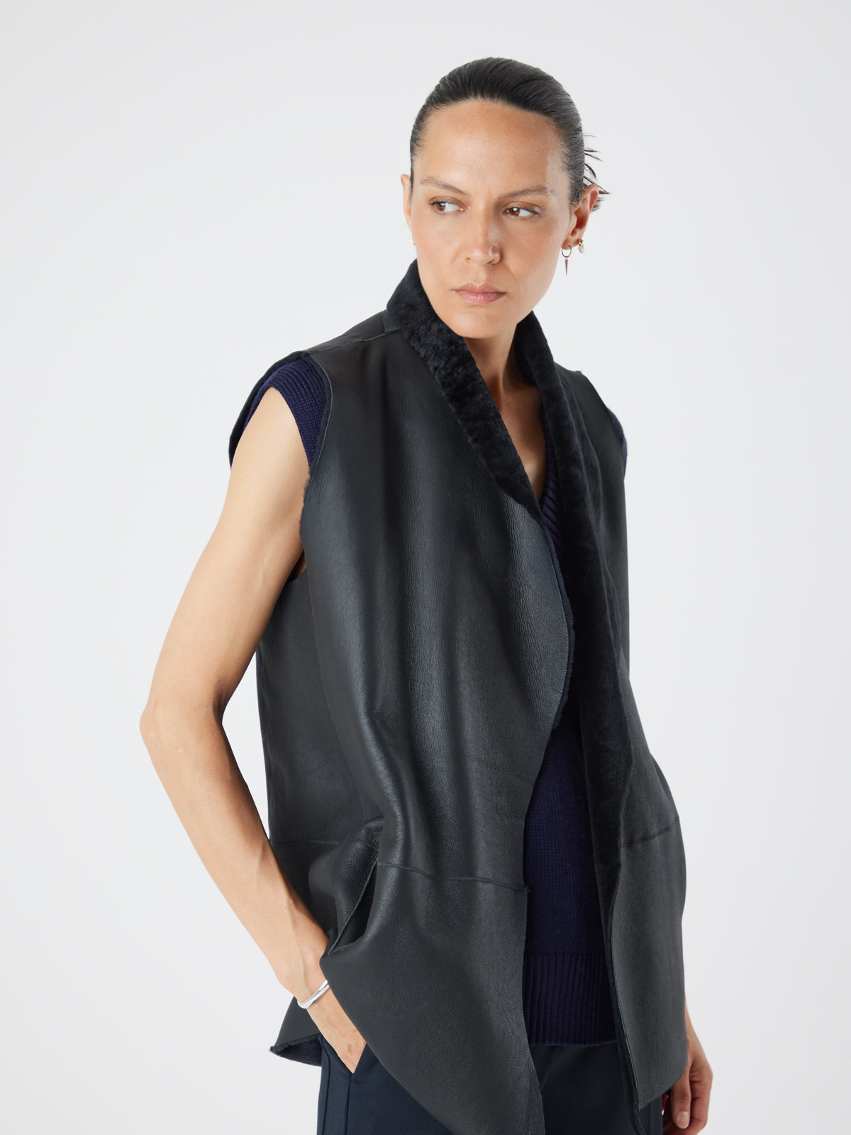 Natural Edge Graphite Black Mid Length Shearling Gilet - model crop reverse