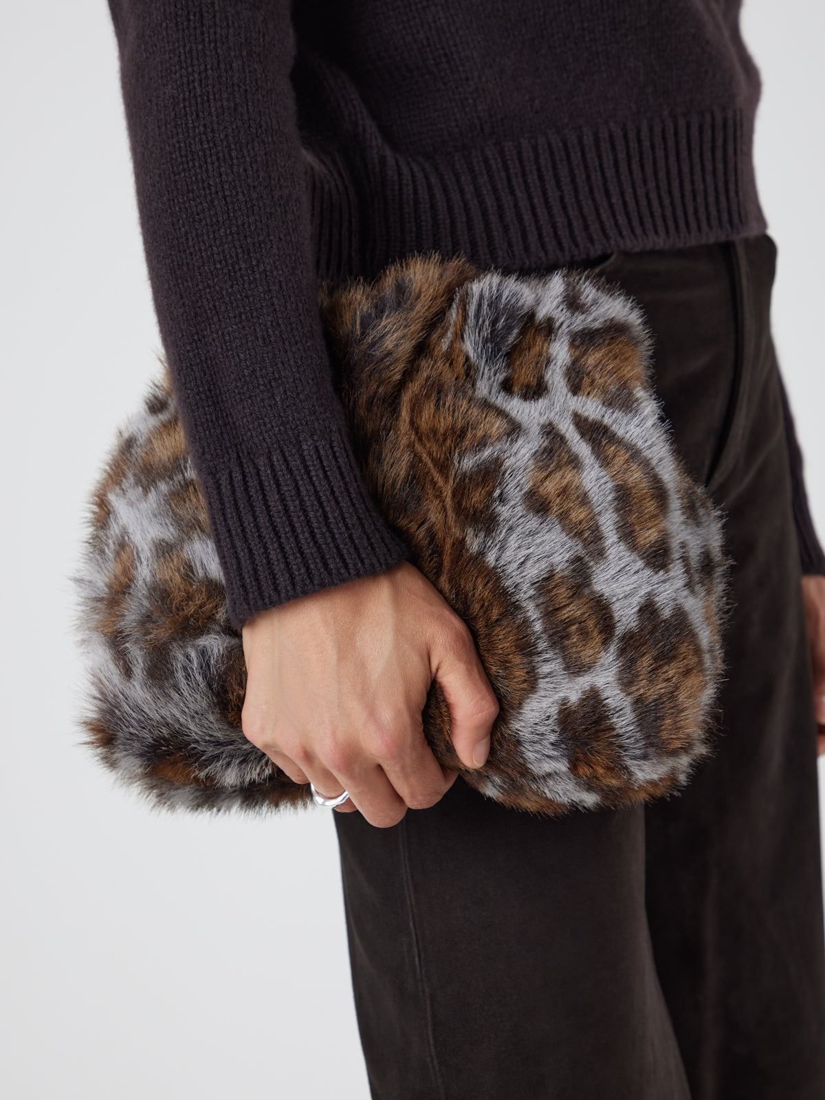 Ocelot Print Soft Shearling Clutch Bag | Womens | Gushlow & Cole - model holding crop in