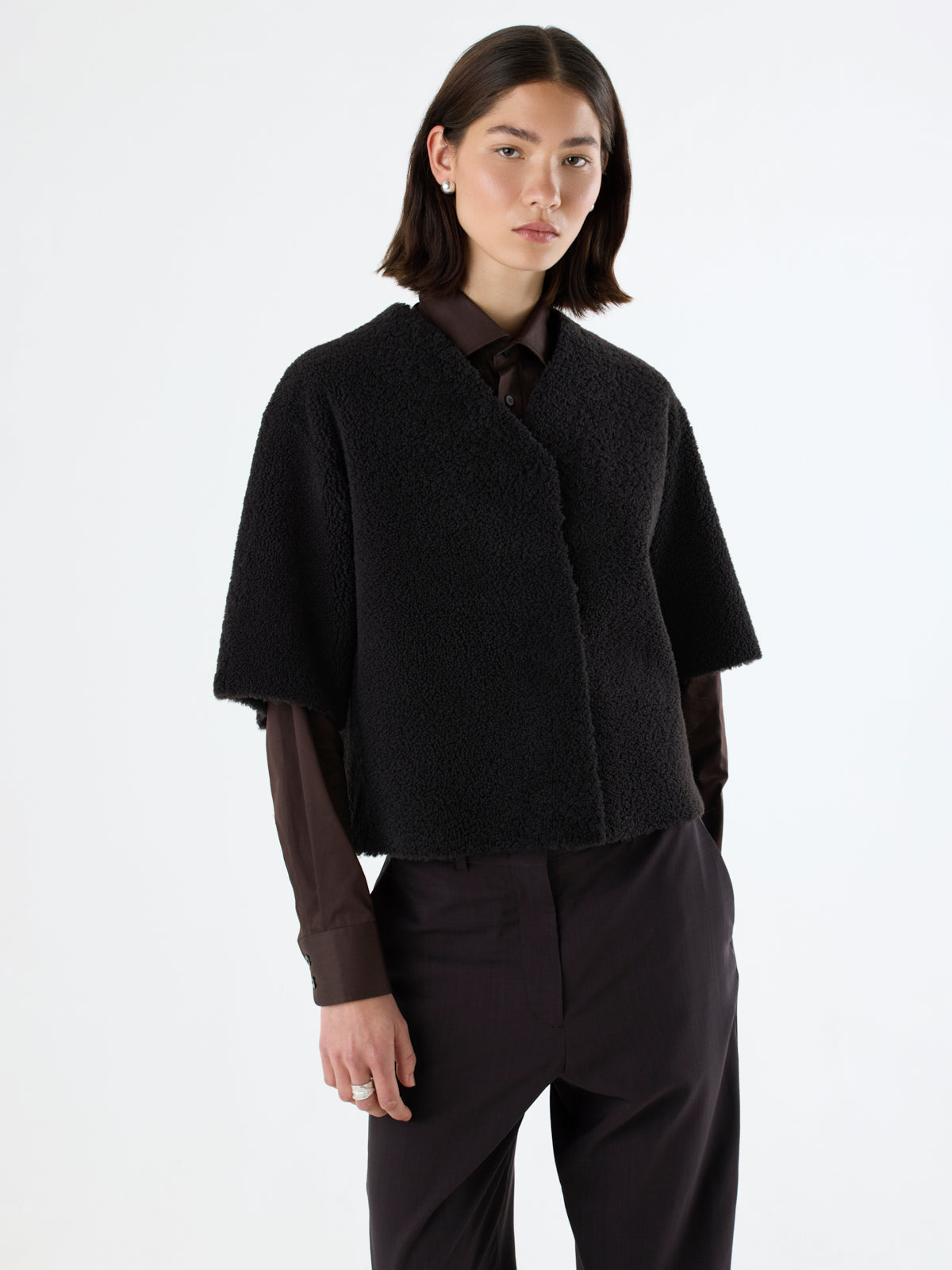 woman wearing short-sleeve dark brown Shearling Cardigan by gushlow & Cole