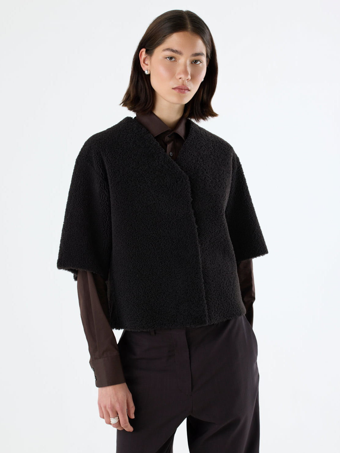 woman wearing short-sleeve dark brown Shearling Cardigan by gushlow & Cole