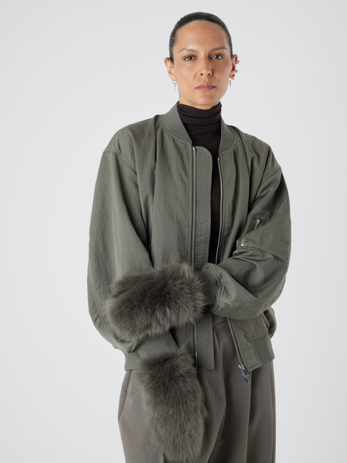 Ultimate Storm Green Touchscreen Shearling Mittens | Womens | Gushlow & Cole-model wearing mittens