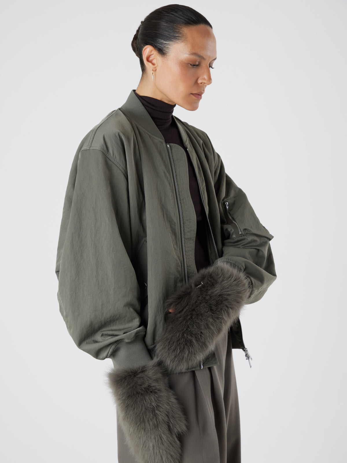 Ultimate Storm Green Touchscreen Shearling Mittens | Womens | Gushlow & Cole-model wearing mittens side