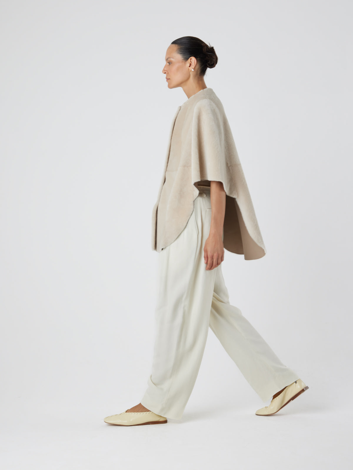 White Collarless Shearling Cape | Womens | Gushlow & Cole- model full length walking