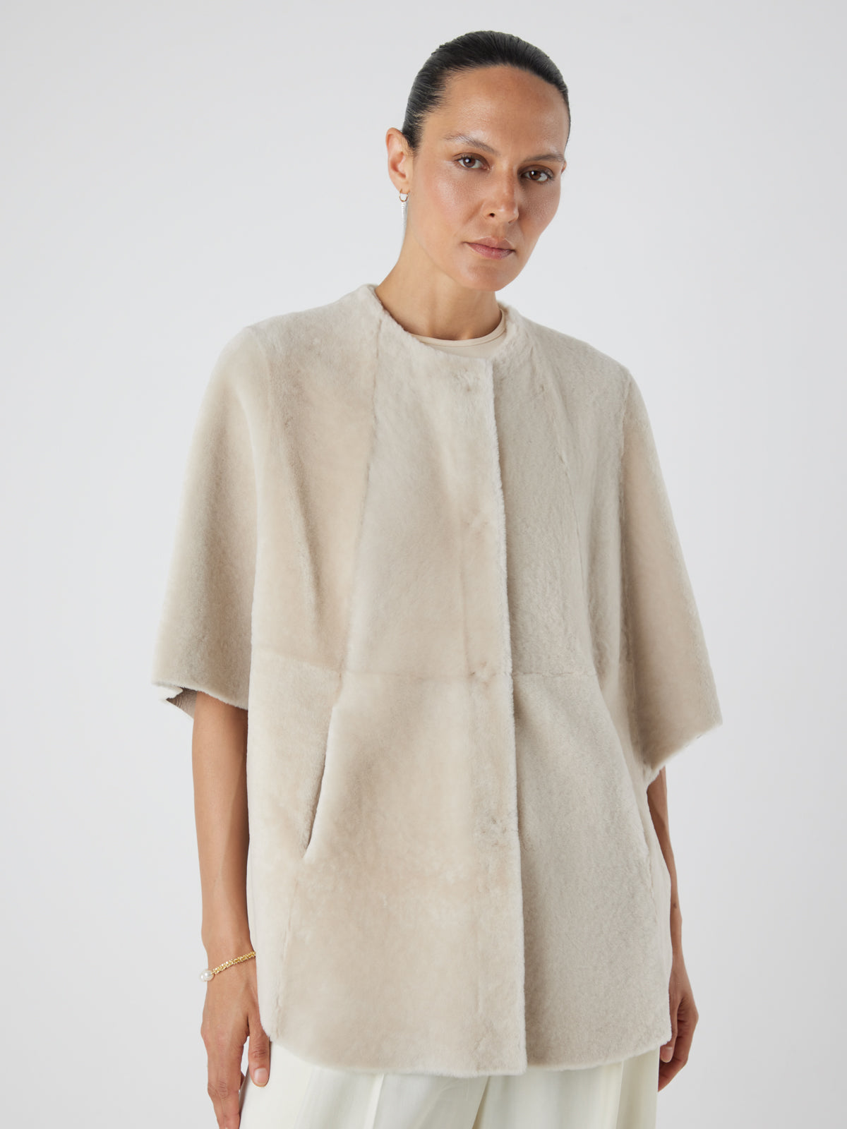 White Collarless Shearling Cape | Womens | Gushlow & Cole- model crop front