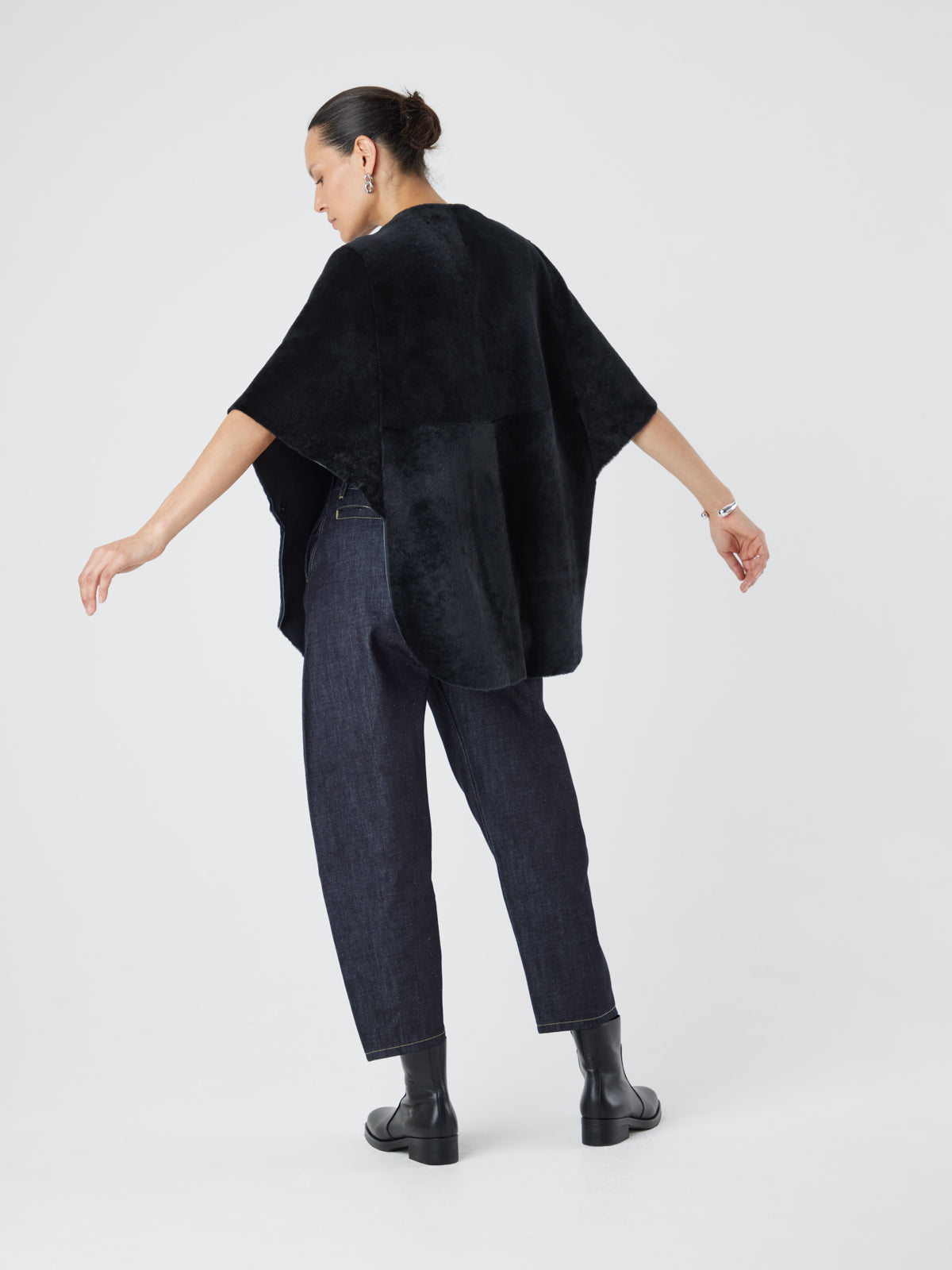 Black Collarless Shearling Cape | Womens | Gushlow & Cole- model full length back