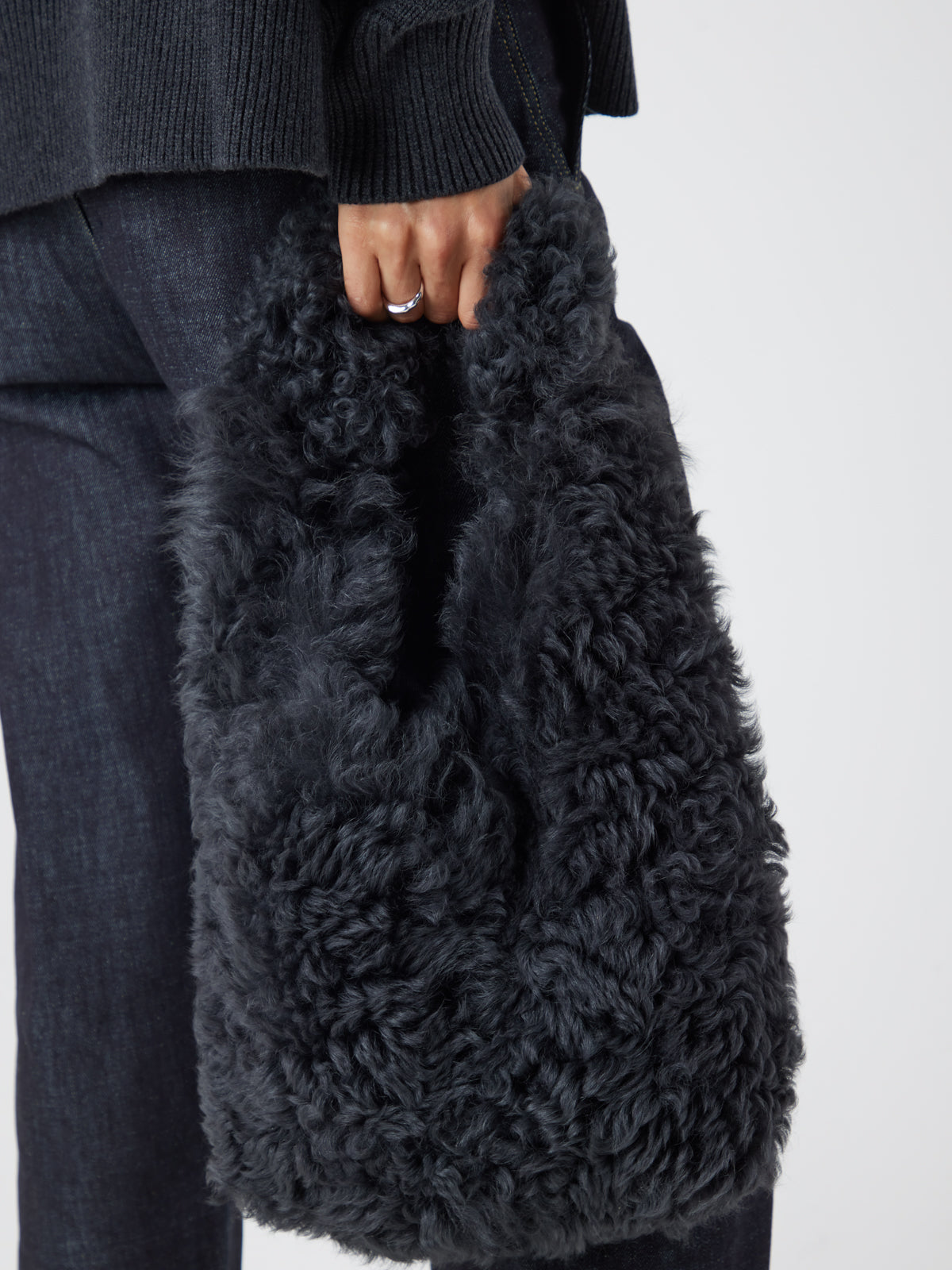 Black Shearling Slouch Bag | Womens | Gushlow & Cole - model crop holding bag