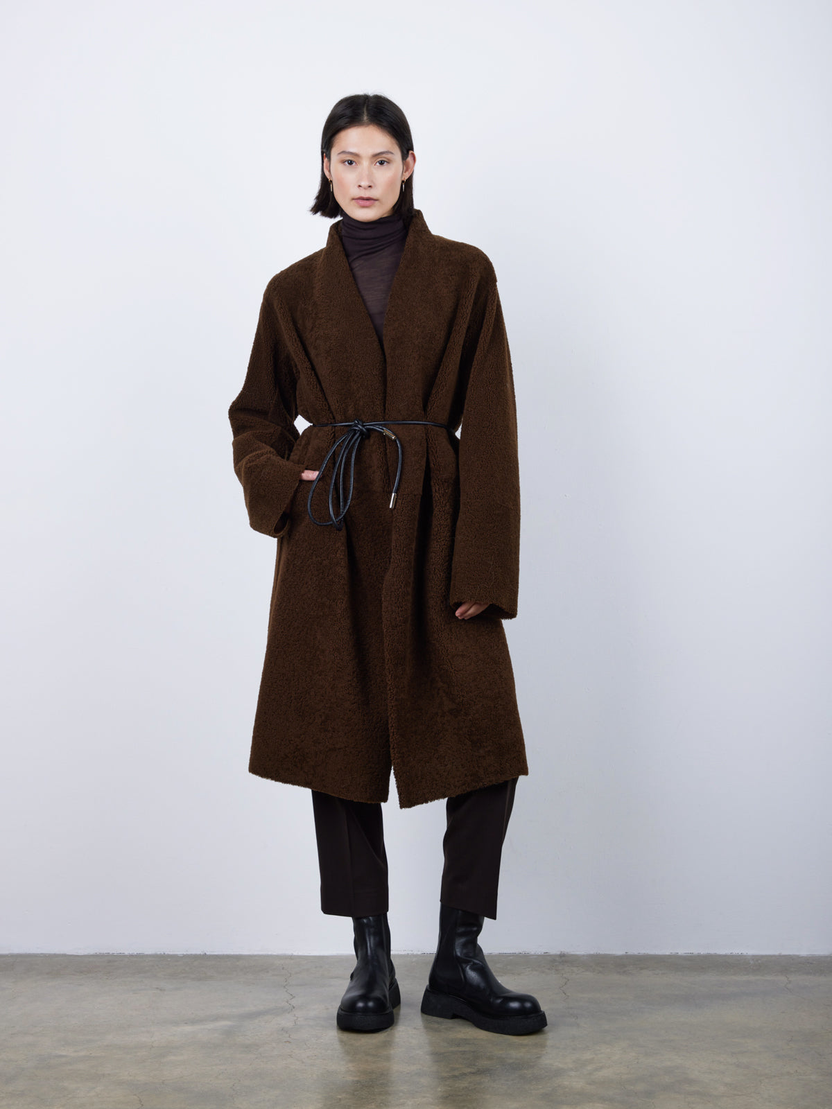 Brown Collarless Shearling Wrap Coat | Womens | Gushlow & Cole - model front with belt