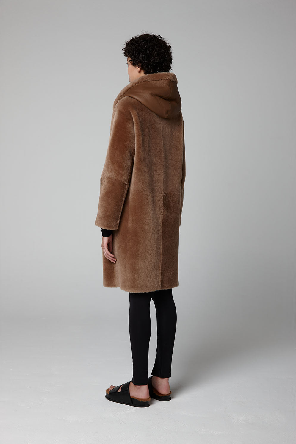 Camel Hooded Shearling Coat - model full length back - women | Gushlow & Cole
