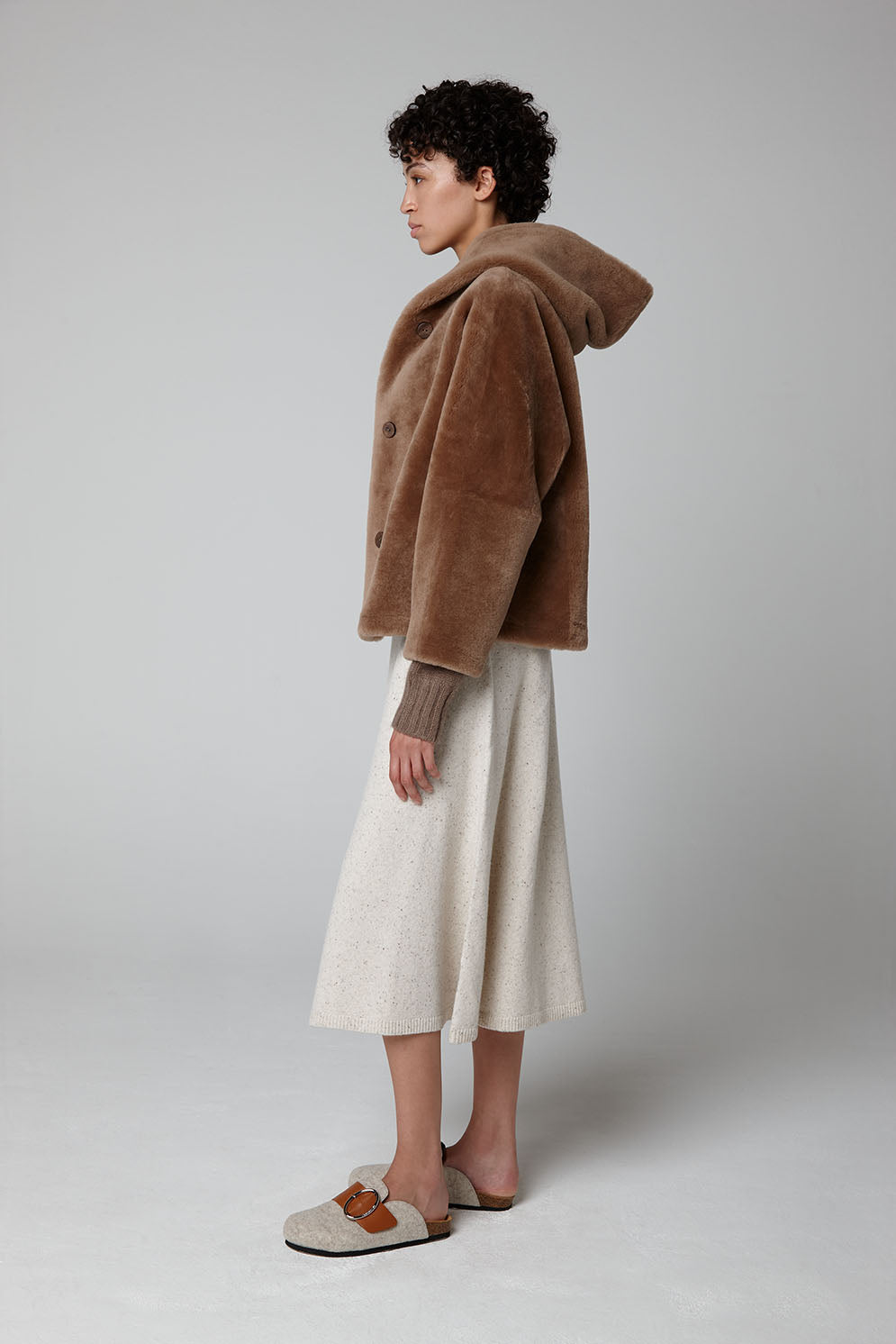 Camel Hooded Shearling Jacket - model full length hood side - women | Gushlow & Cole