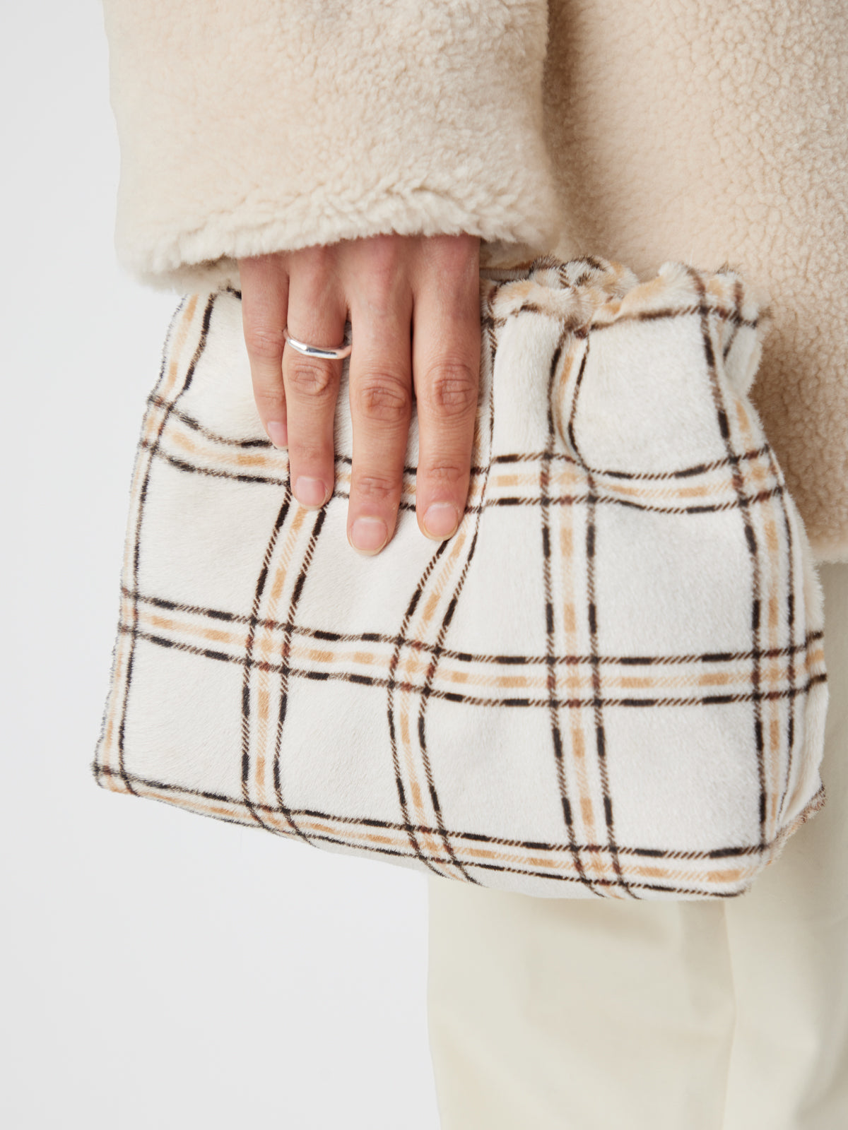 Check Print Soft Shearling Clutch Bag | Womens | Gushlow & Cole- close crop model holding bag