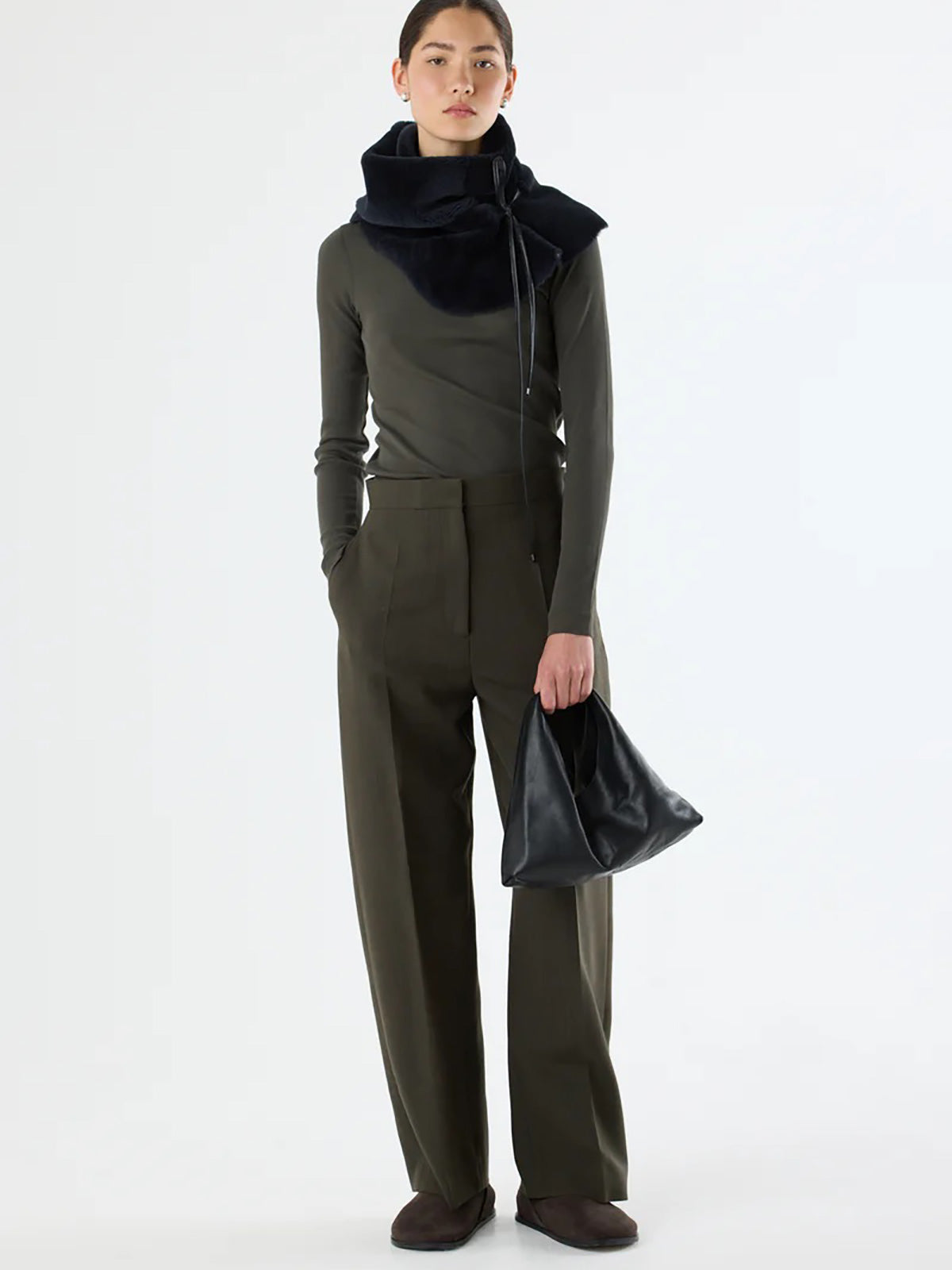 Clara Small Black Leather Shoulder Bag | Bags | Gushlow & Cole - model full length holding bag