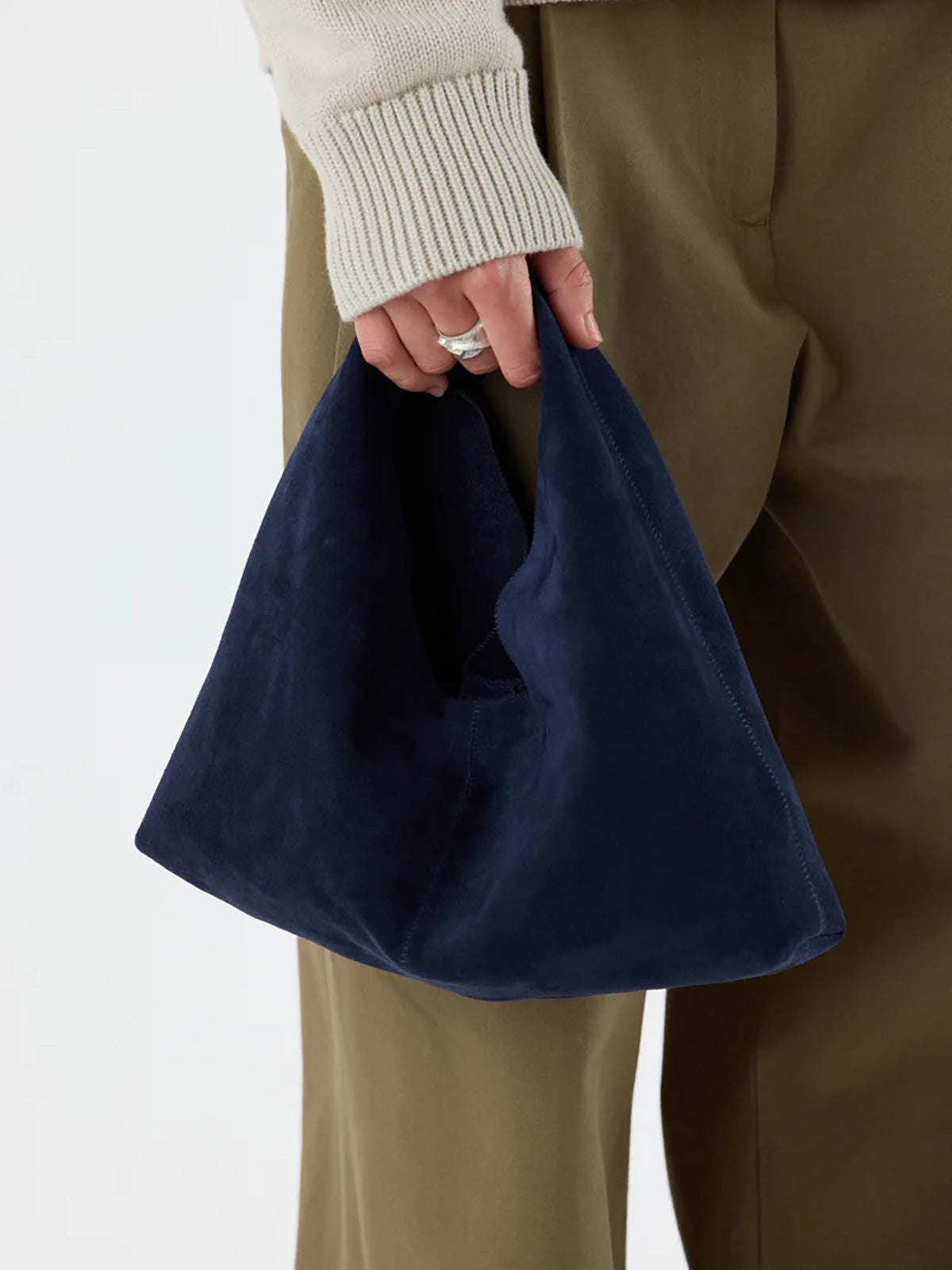 Clara Small Navy Blue Suede Shoulder Bag | Bags | Gushlow & Cole - crop model holding bag