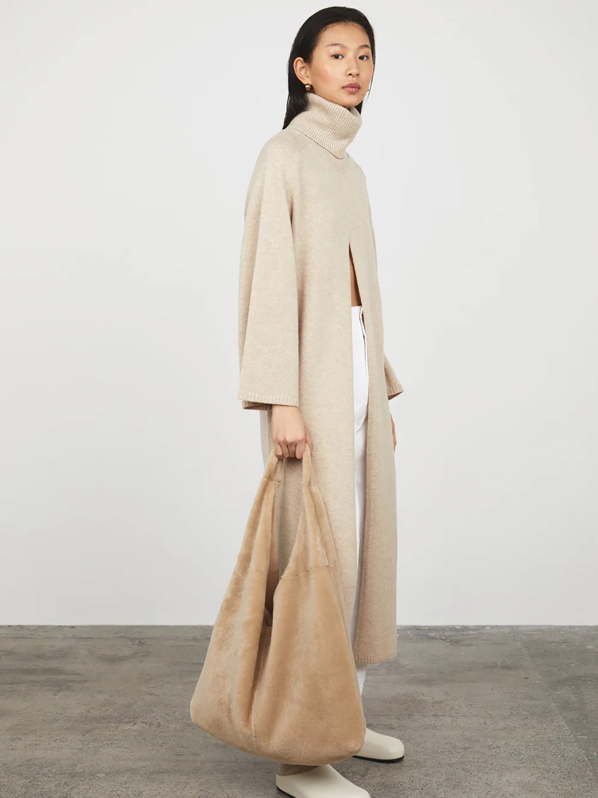 Cream Large Shearling Slouch Bag gushlow and cole womens shearling model bag down