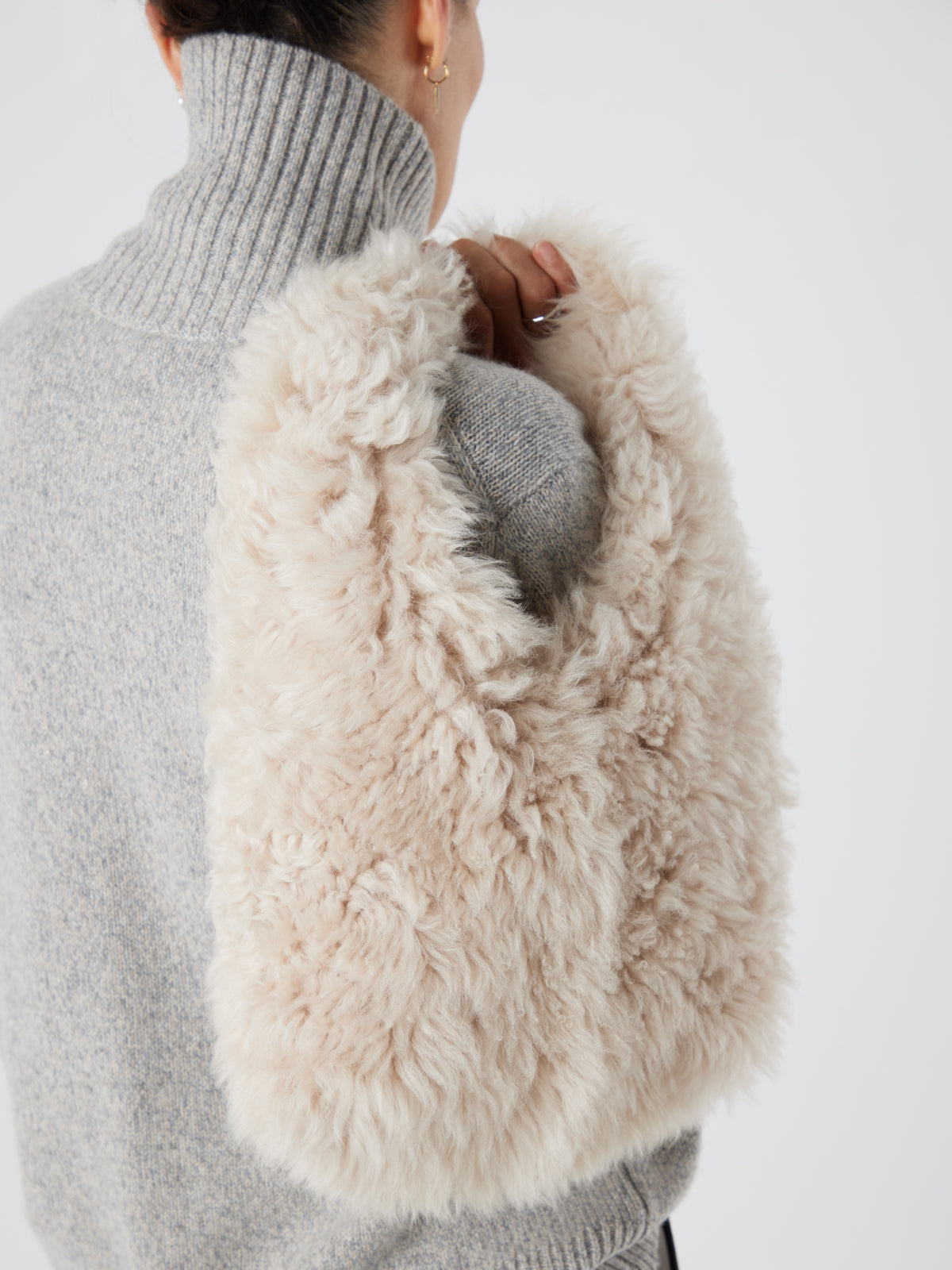Cream Shearling Slouch Bag | Womens | Gushlow & Cole - model crop holding bag over shoulder