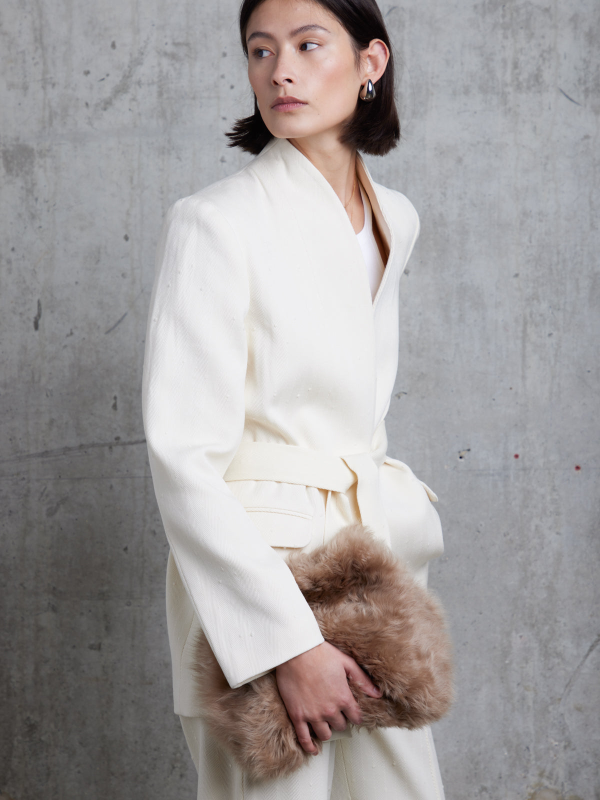 Curly Soft Shearling Camel Clutch Bag | Womens | Gushlow & Cole - model side crop