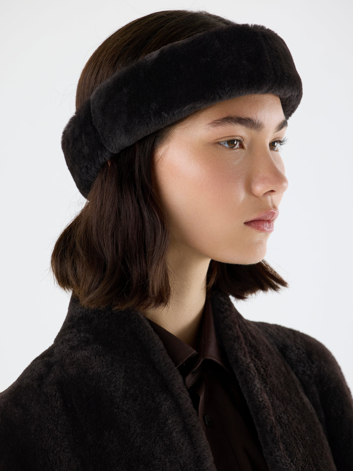 woman wearing Padded Dark Brown Shearling Headband by gushlow & cole