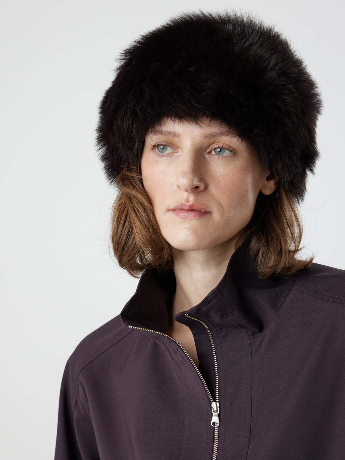 woman wearing dark brown shearling russian hat by gushlow & cole