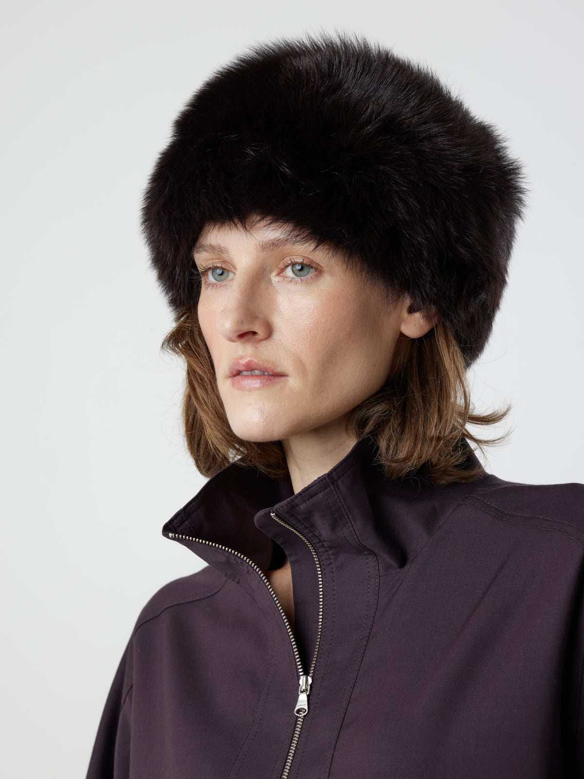woman wearing dark brown shearling russian hat by gushlow & cole