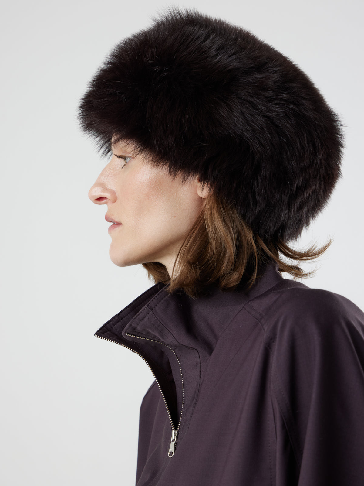 woman wearing dark brown shearling russian hat by gushlow & cole