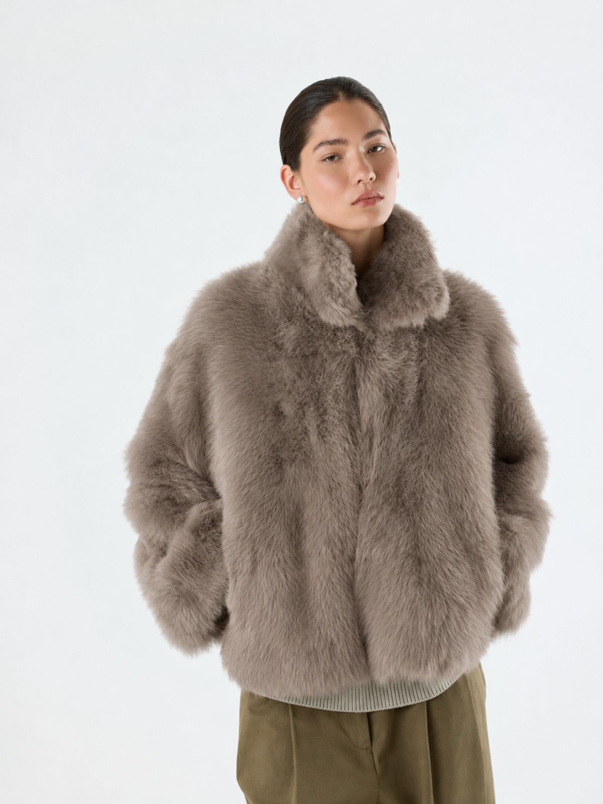 woman wearing Funnel Collar taupe Shearling jacket by gushlow & cole