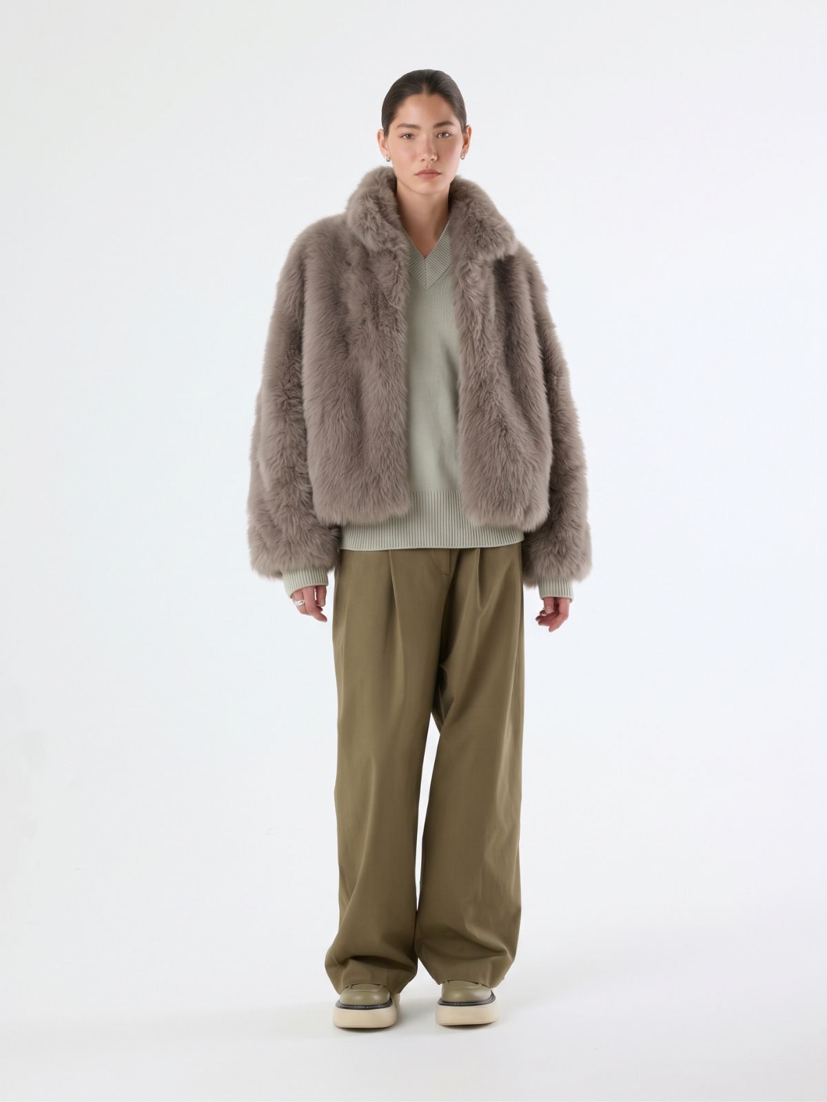 woman wearing Funnel Collar taupe Shearling jacket by gushlow & cole