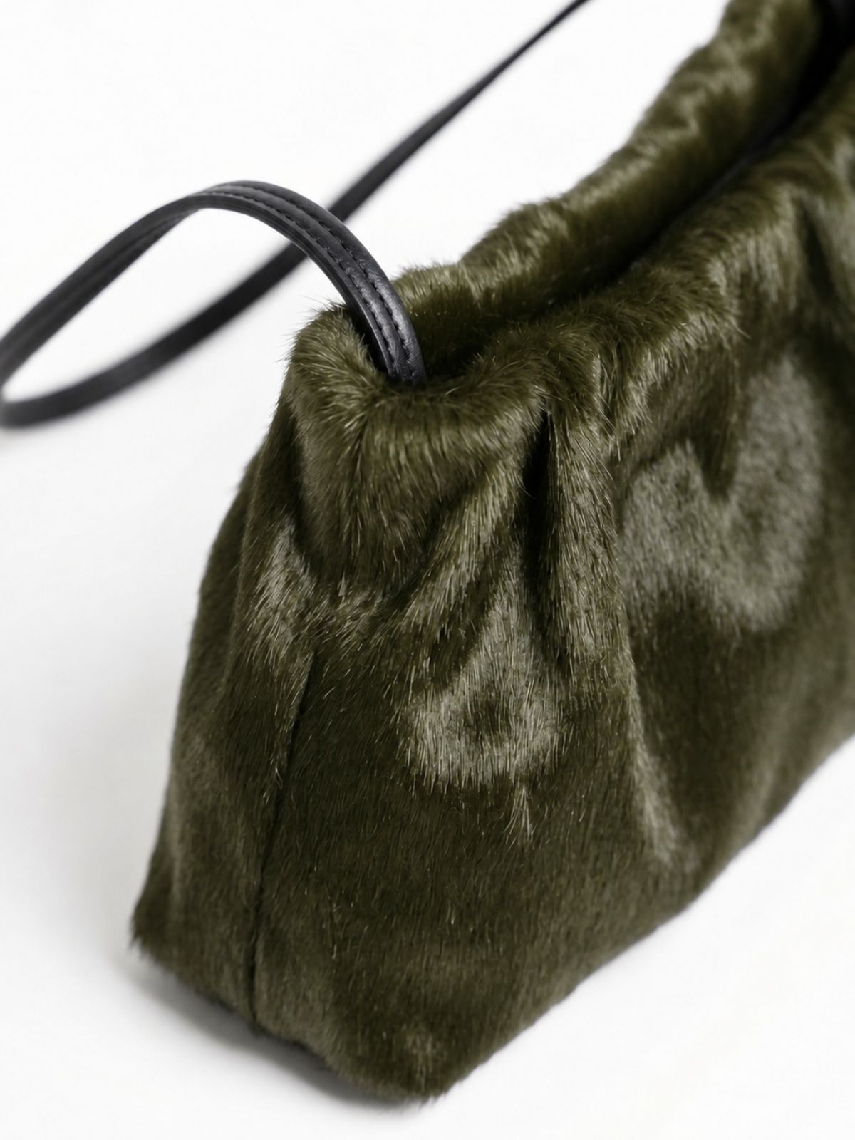ghia small green shoulder bag made in calfskin on white background by gushlow & cole