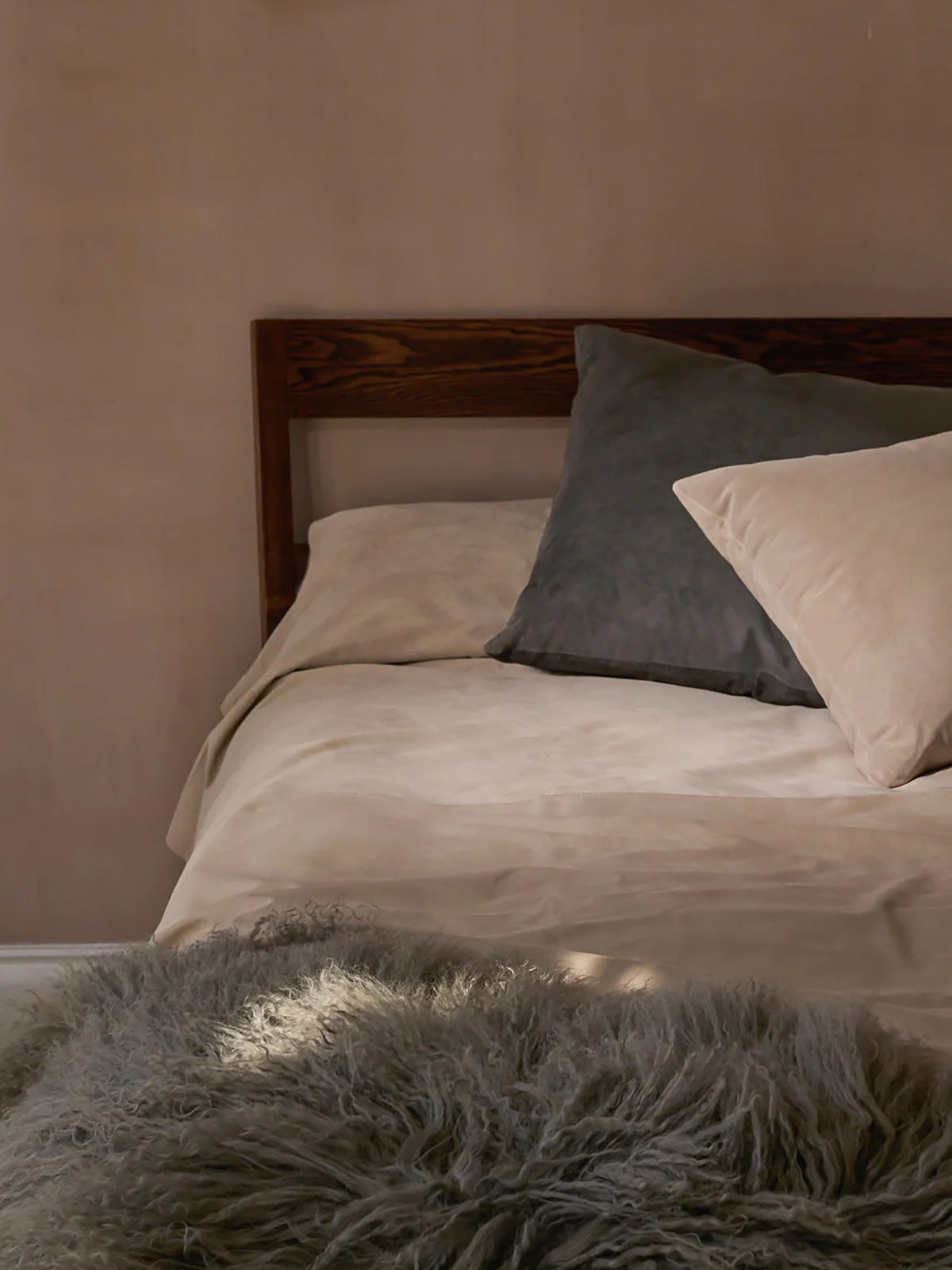 Grey Mongolian Shearling Throw | Home | Gushlow & Cole - lifestyle image of throw on bed
